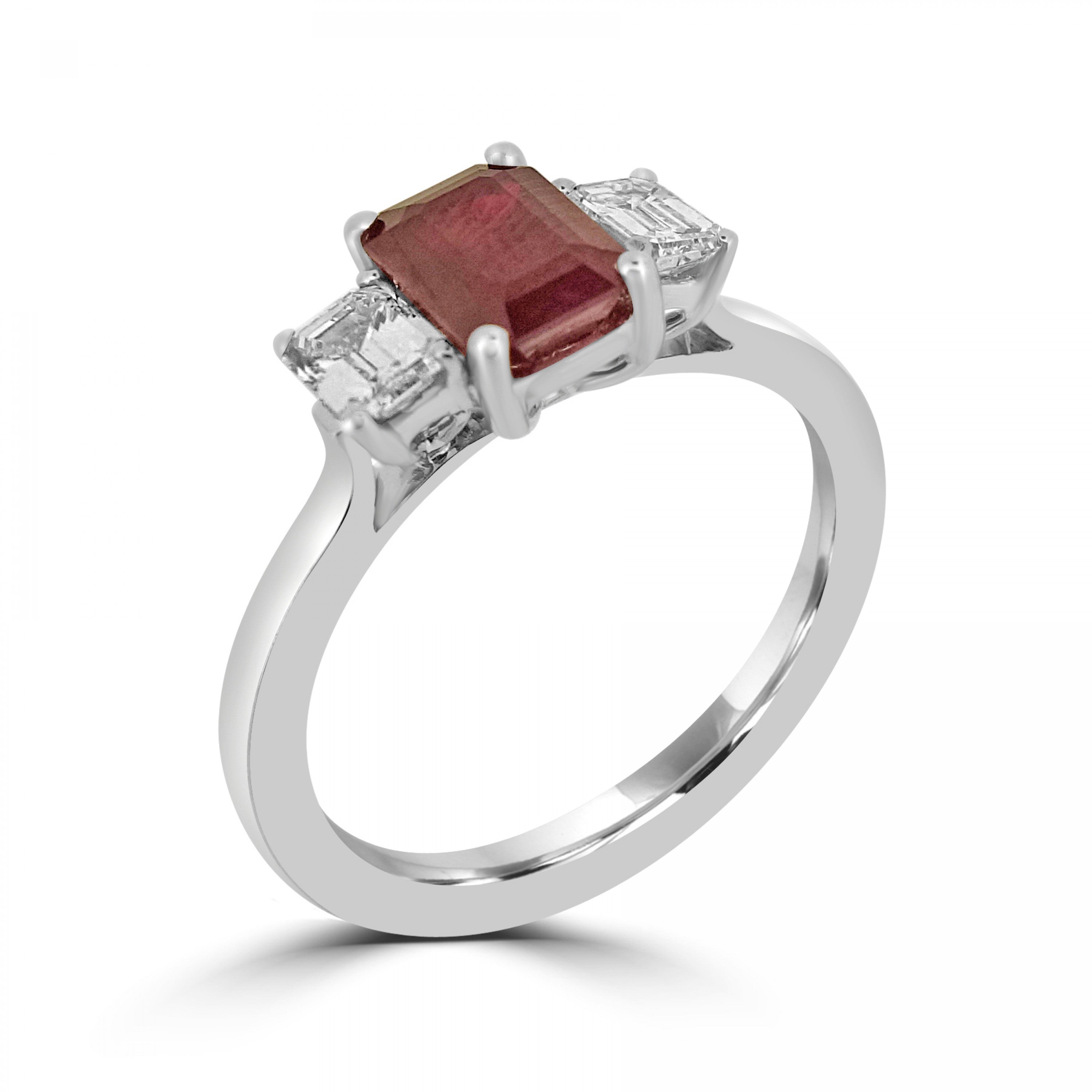 Emerald cut ruby three stone diamond engagement ring from fogal and barnes fine jewellers of harrogate set on platinum or 18k gold.