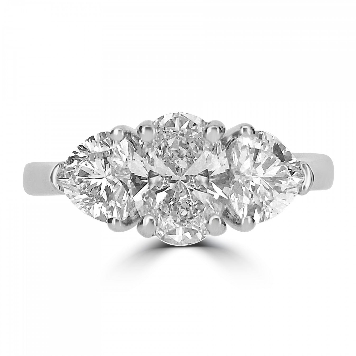 OVAL CUT DIAMOND TRILOGY ENGAGEMENT RING