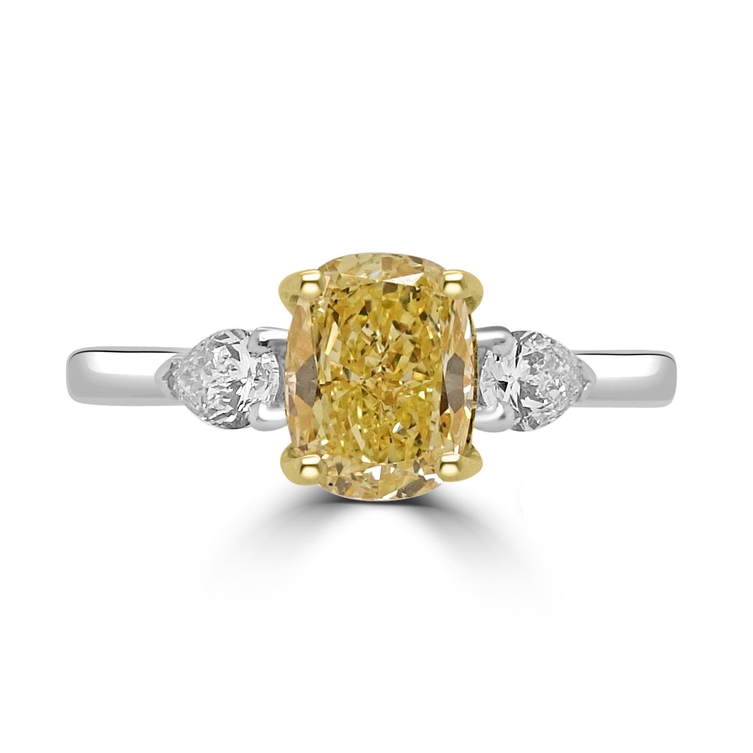 Cushion Cut Yellow Diamond Trilogy Engagement Ring with 2 pear cut Diamond on Platinum or 18ct white gold. Fogal and Barnes Fine Jewellers in Harrogate
