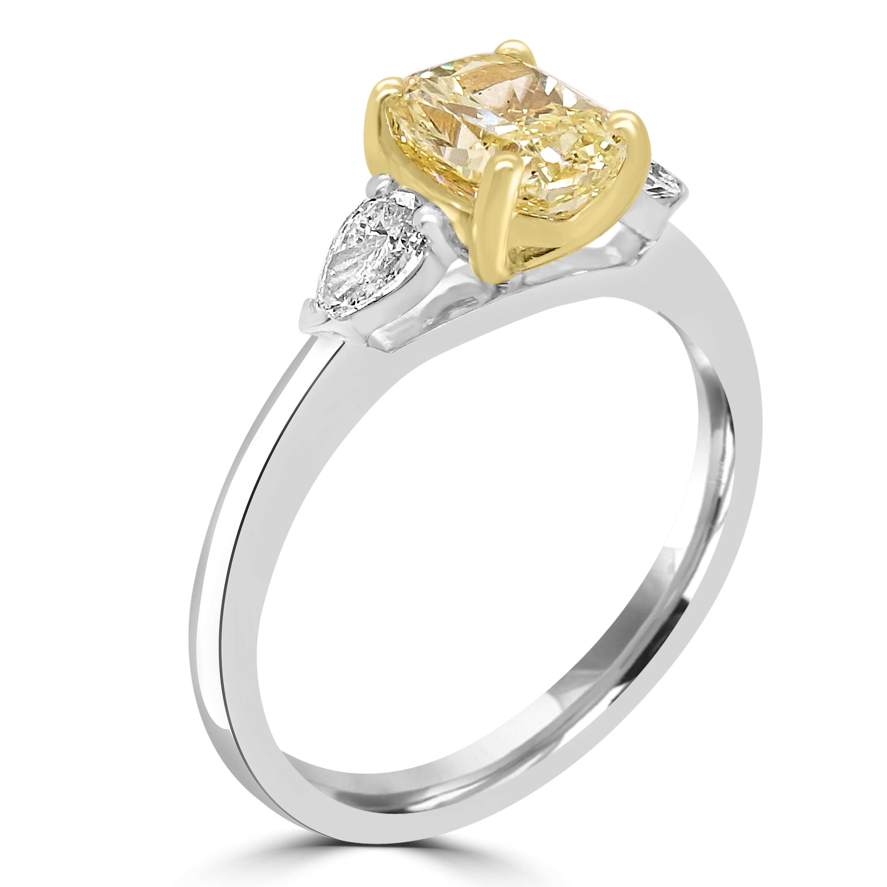Cushion Cut Yellow Diamond Trilogy Engagement Ring with 2 pear cut Diamond on Platinum or 18ct white gold. Fogal and Barnes Fine Jewellers in Harrogate