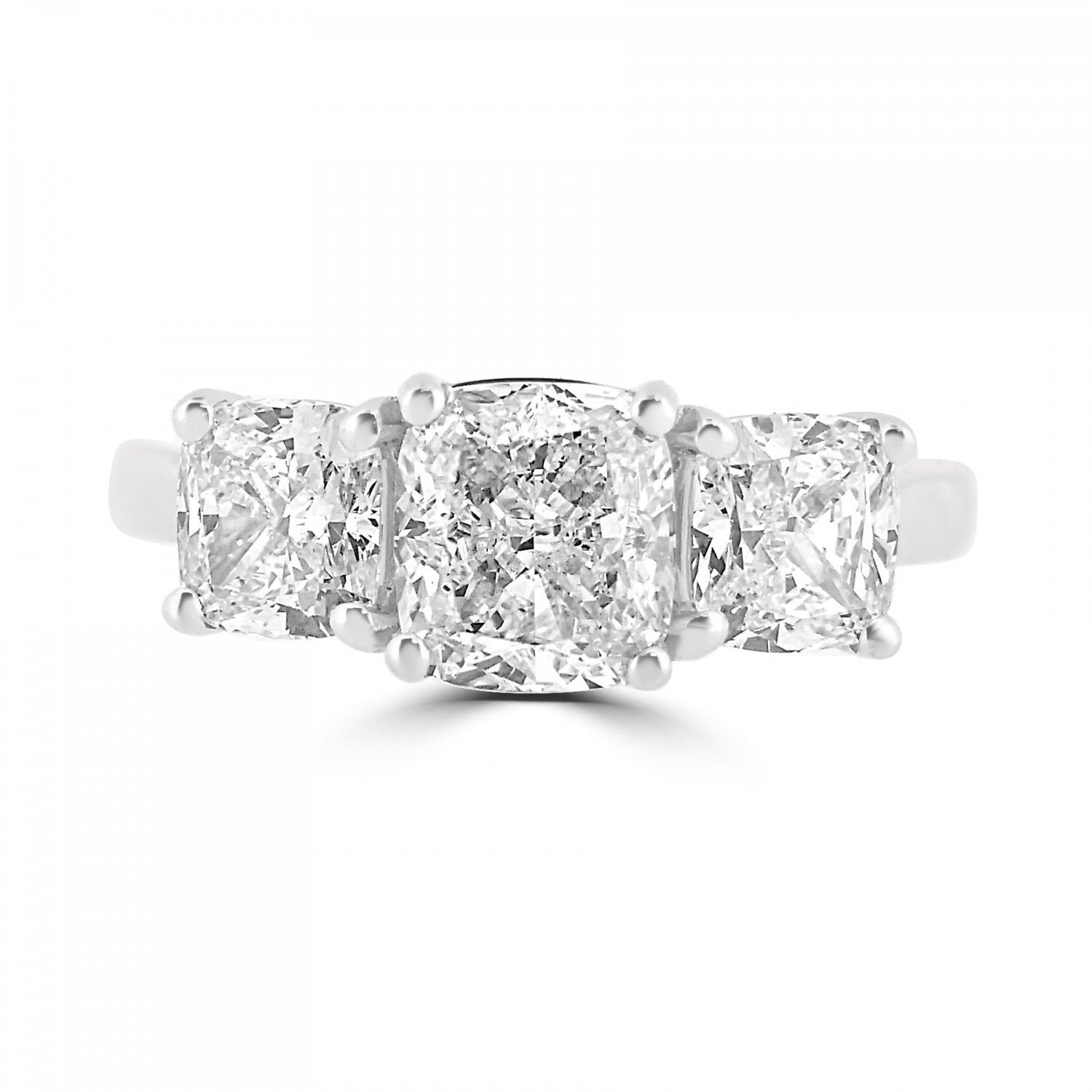 Cushion cut diamond trilogy engagement ring harrogate with 18ct white gold or platinum setting. Fogal and Barnes Fine Jewellers of Harrogate