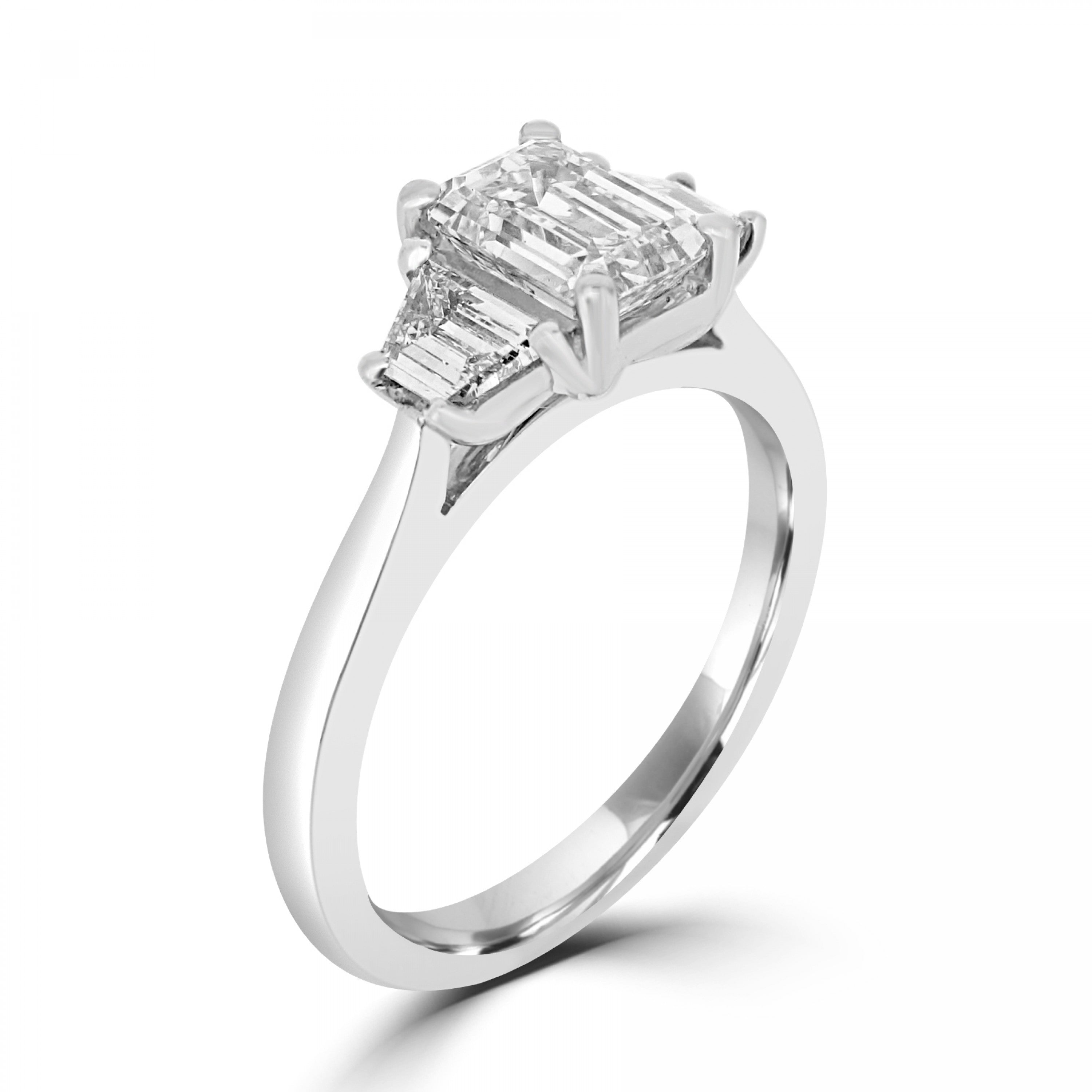 Emerald cut three diamond engagement ring set on platinum from fogal and barnes fine jewellers of Harrogate