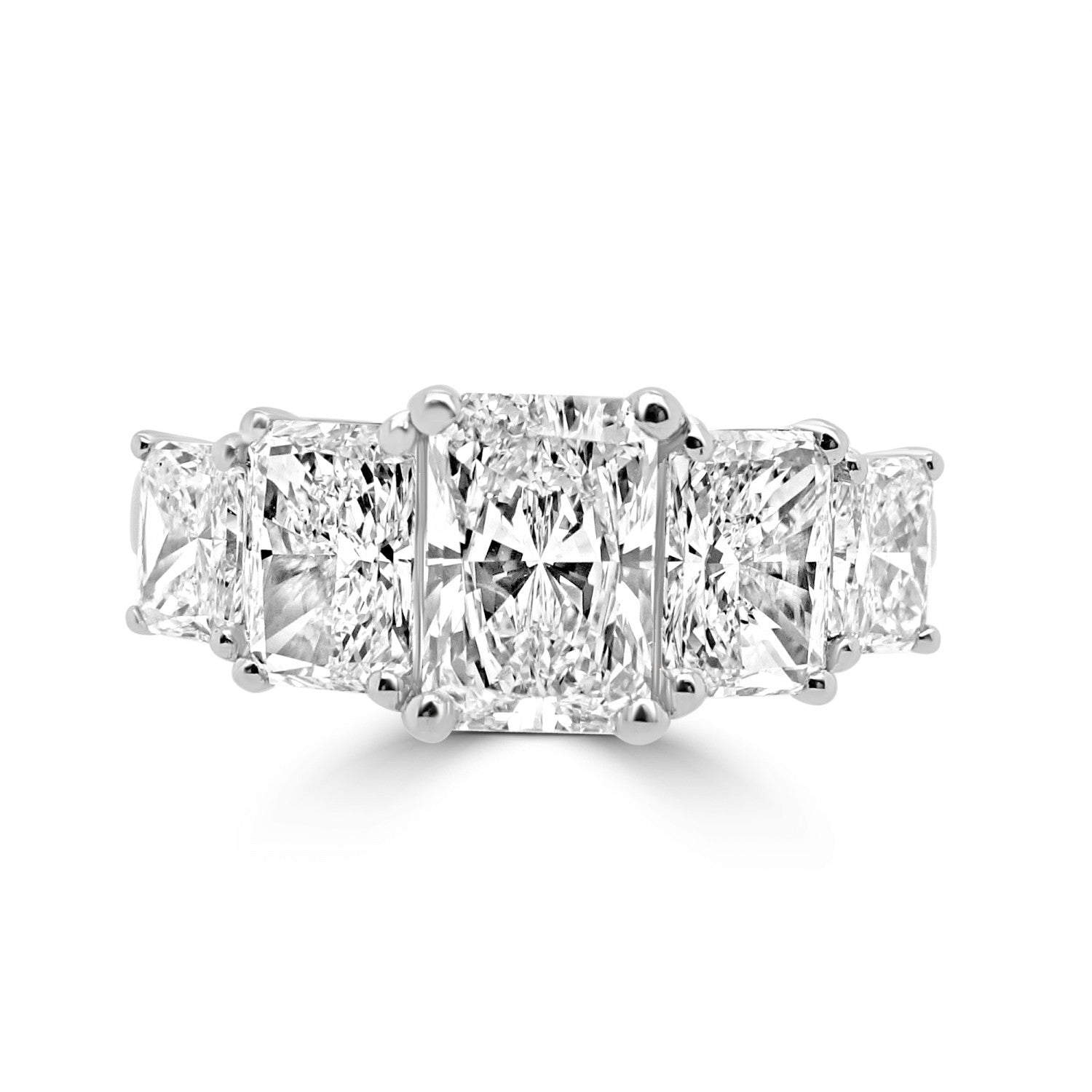 GRADUATED EMERALD CUT DIAMOND ENGAGEMENT RING