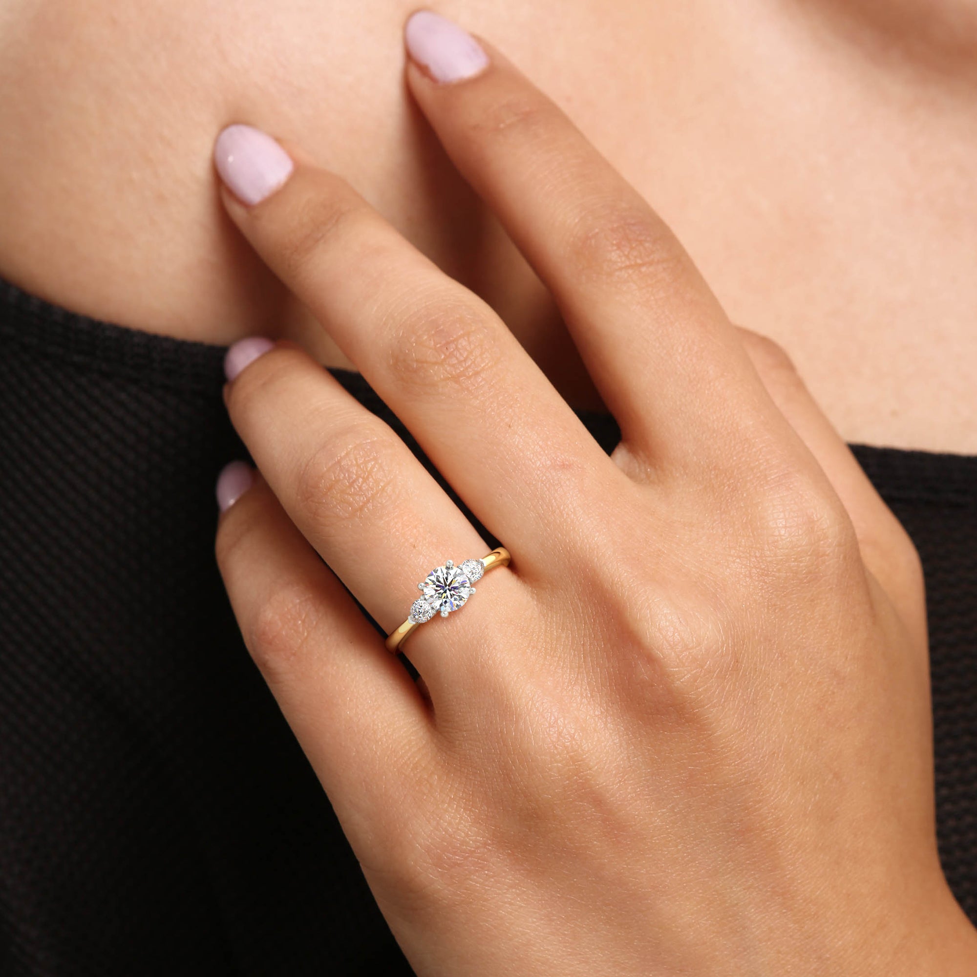 round diamond and pear cut engagement ring set on 18 k yellow gold with a platinum head from fogal and barnes fine jewellers of Harrogate