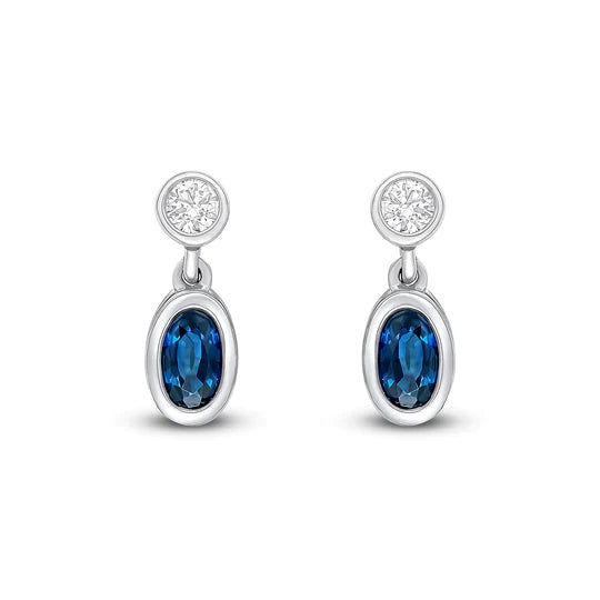 0.63CT OVAL SAPPHIRE AND ROUND DIAMOND TWO STONE EARRINGS- HARROGATE