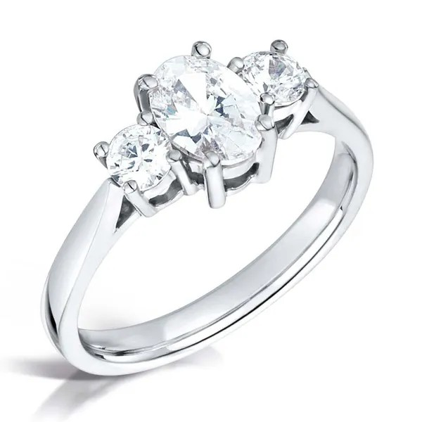 Oval and round diamond three stne engagement ring from fogal and barnes in harrogate set on 18k white gold