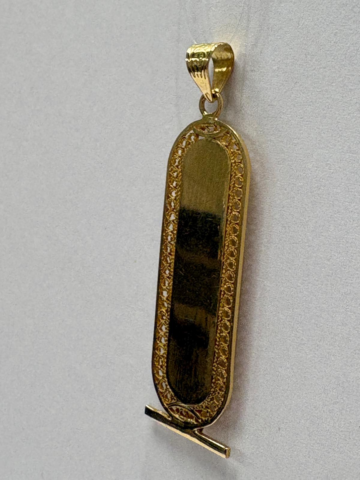 Vintage Egyptian 18ct yellow gold cartouche pendant with hieroglyphic engravings including ankh symbol and intricate filigree border, 3.96g, shown front and back and worn on neck, available at Fogal & Barnes Harrogate