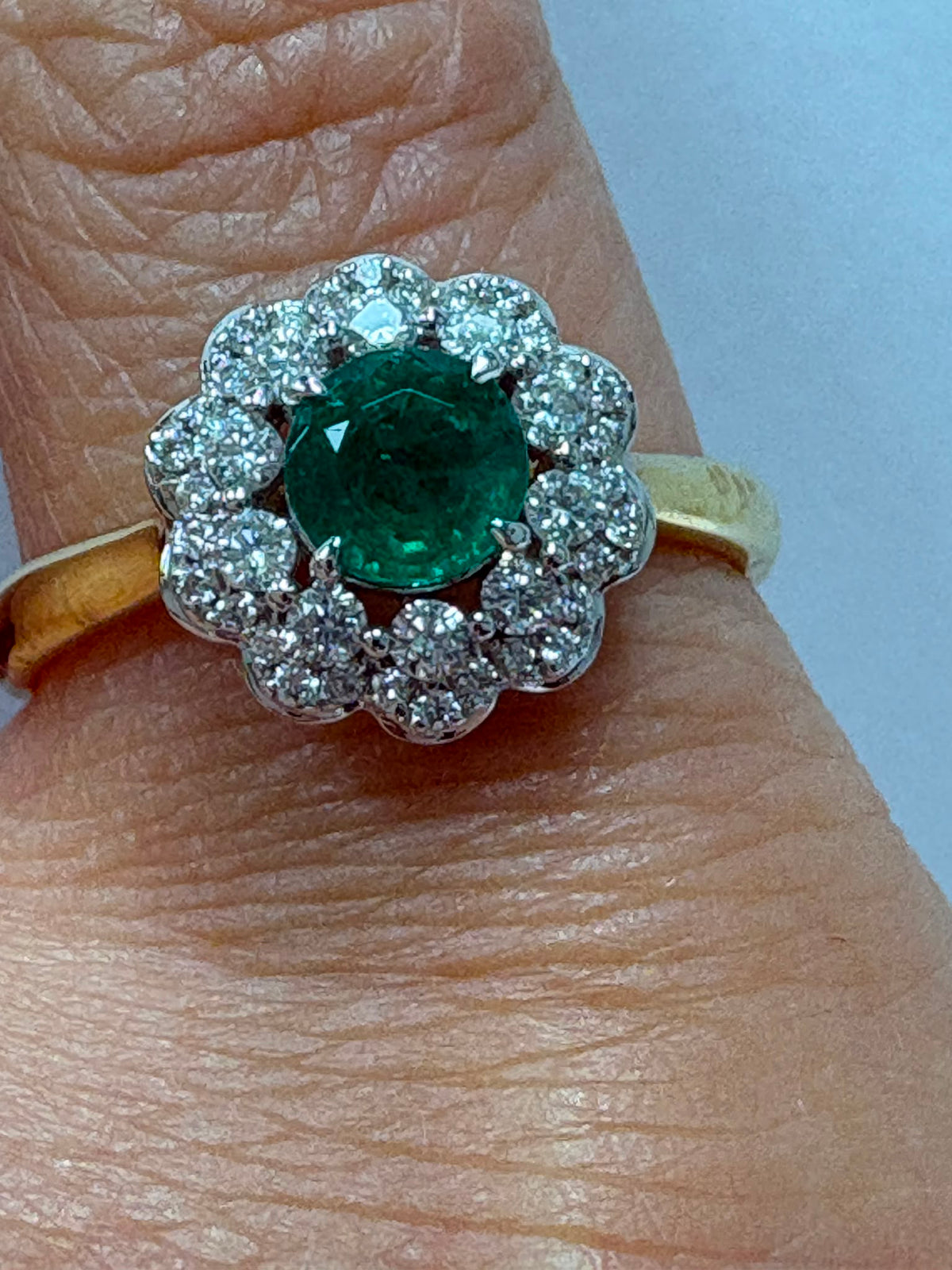 emerald diamond cluster ring, 18ct gold emerald ring, round emerald ring, emerald engagement ring alternative, pre-loved emerald ring UK, emerald cluster ring Harrogate, diamond halo emerald ring, second hand emerald ring size N