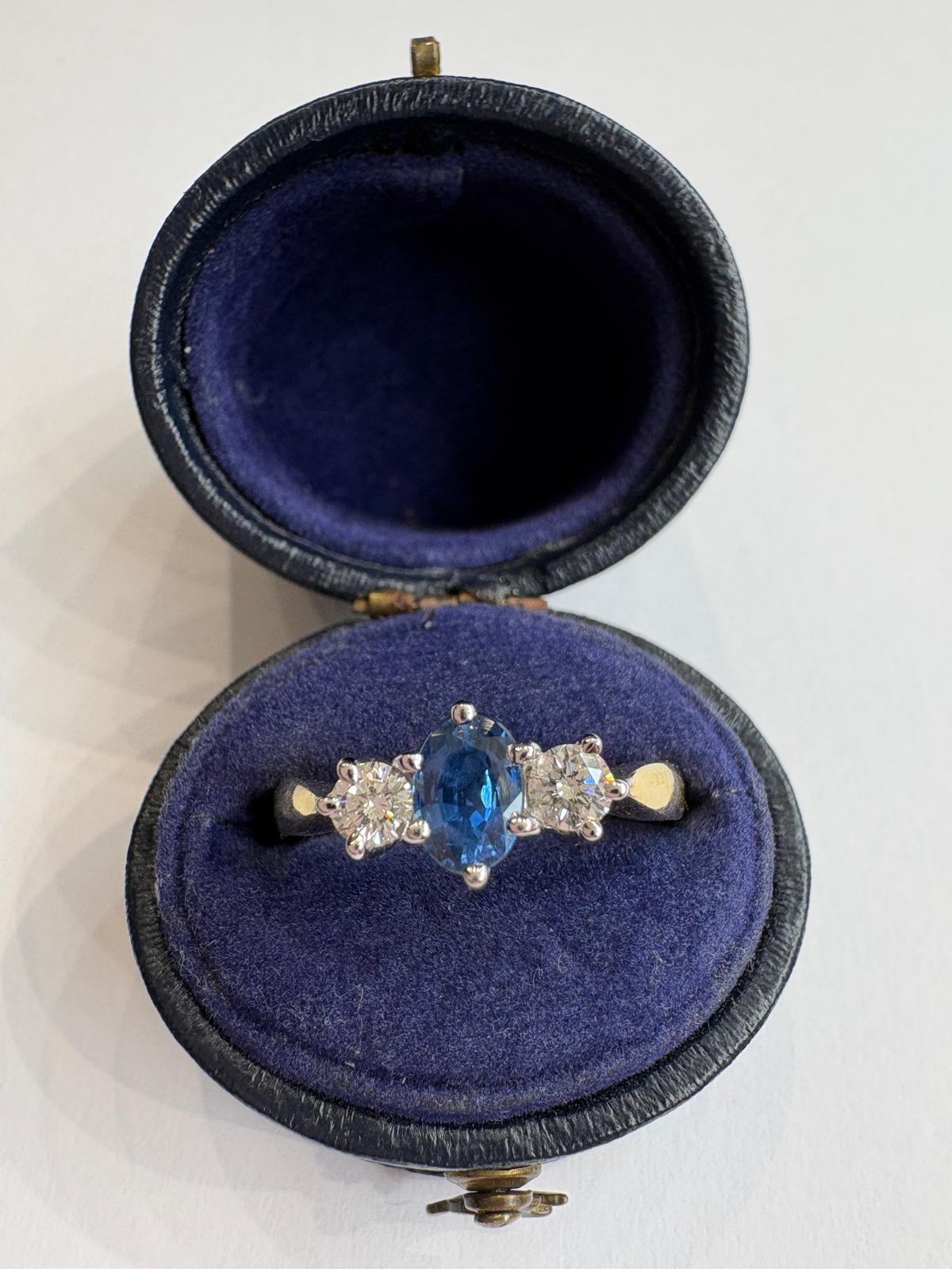 sapphire and diamond ring, three stone sapphire ring, 18ct gold sapphire ring, second hand sapphire ring UK, pre-loved sapphire ring, vintage sapphire ring, oval sapphire ring, September birthstone ring, sapphire trilogy ring, second hand jewellery Harrogate, second hand jewellery Leeds, second hand jewellery York, second hand jewellery Yorkshire, pre-owned sapphire ring UK, 18ct sapphire engagement ring, buy second hand sapphire ring, sapphire ring size L, sapphire ring near me, fine jewellery Harrogate, p