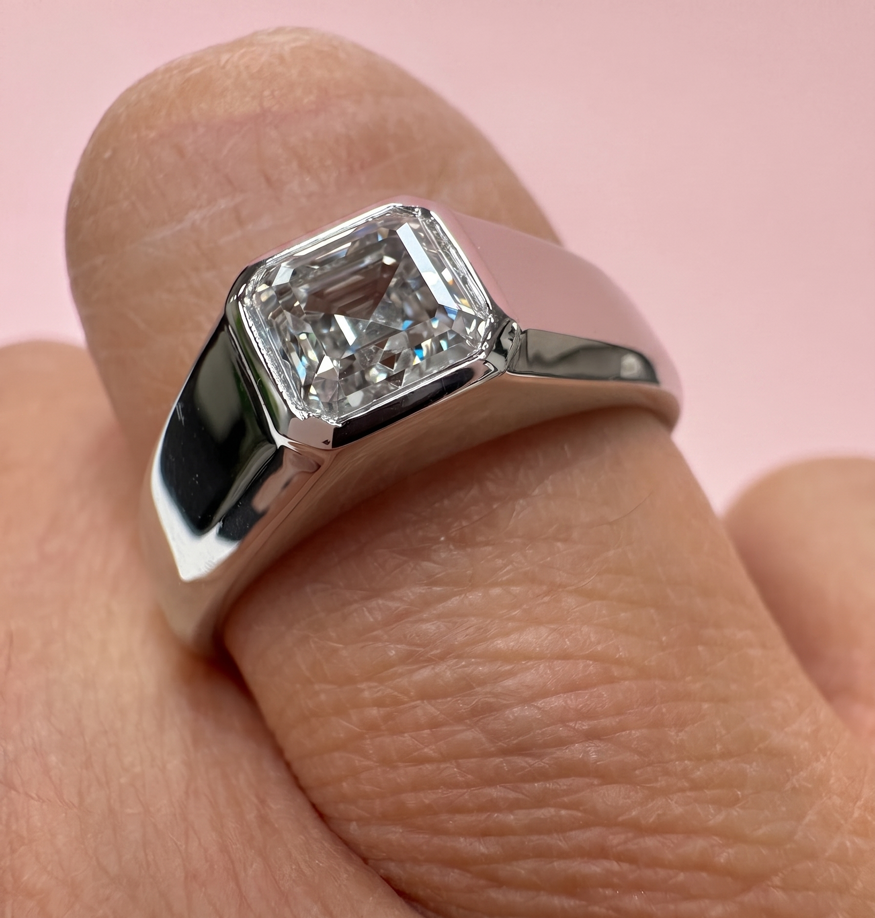 Asscher cut engagement ring, Asscher cut diamond ring, bezel set diamond ring, art deco style engagement ring, chunky Asscher ring, lab grown diamond engagement ring UK, bespoke diamond ring Harrogate, platinum Asscher ring, 18ct gold Asscher ring, certified lab grown diamond, 1.50ct diamond ring, custom engagement ring Yorkshire, statement solitaire ring, geometric diamond ring, lab grown diamond ring near me, DVS1 Asscher diamond