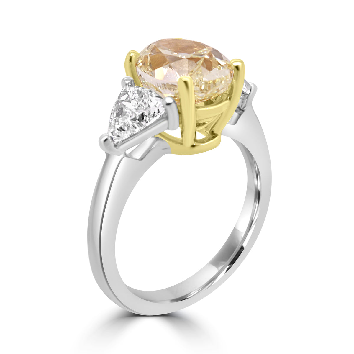 fancy yellow diamond ring, natural yellow diamond engagement ring, GIA certified yellow diamond, oval yellow diamond ring, three stone diamond ring UK, fancy colour diamond jeweller