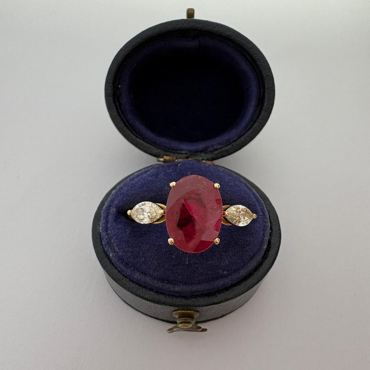 ruby and diamond ring, 3 carat ruby ring, oval ruby ring UK, marquise diamond ring, east west marquise ring, ruby engagement ring, ruby anniversary ring, 18ct gold ruby ring