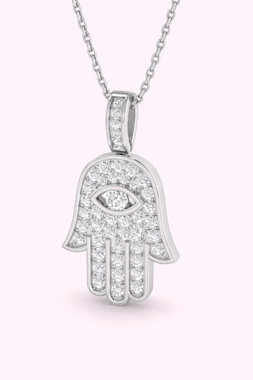 Lab-grown diamond Hamsa pendant in yellow gold with evil eye detail on fine chain, bespoke jewellery by Fogal & Barnes Harrogate