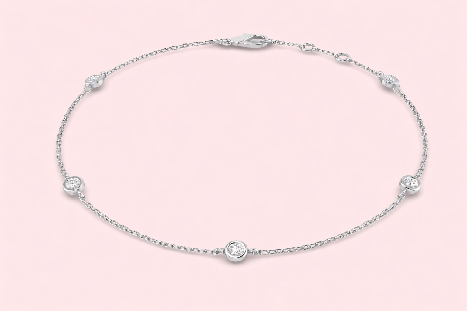 Lab-grown diamond station bracelet in yellow and white gold with bezel set diamonds, bespoke jewellery by Fogal and Barnes Harrogate