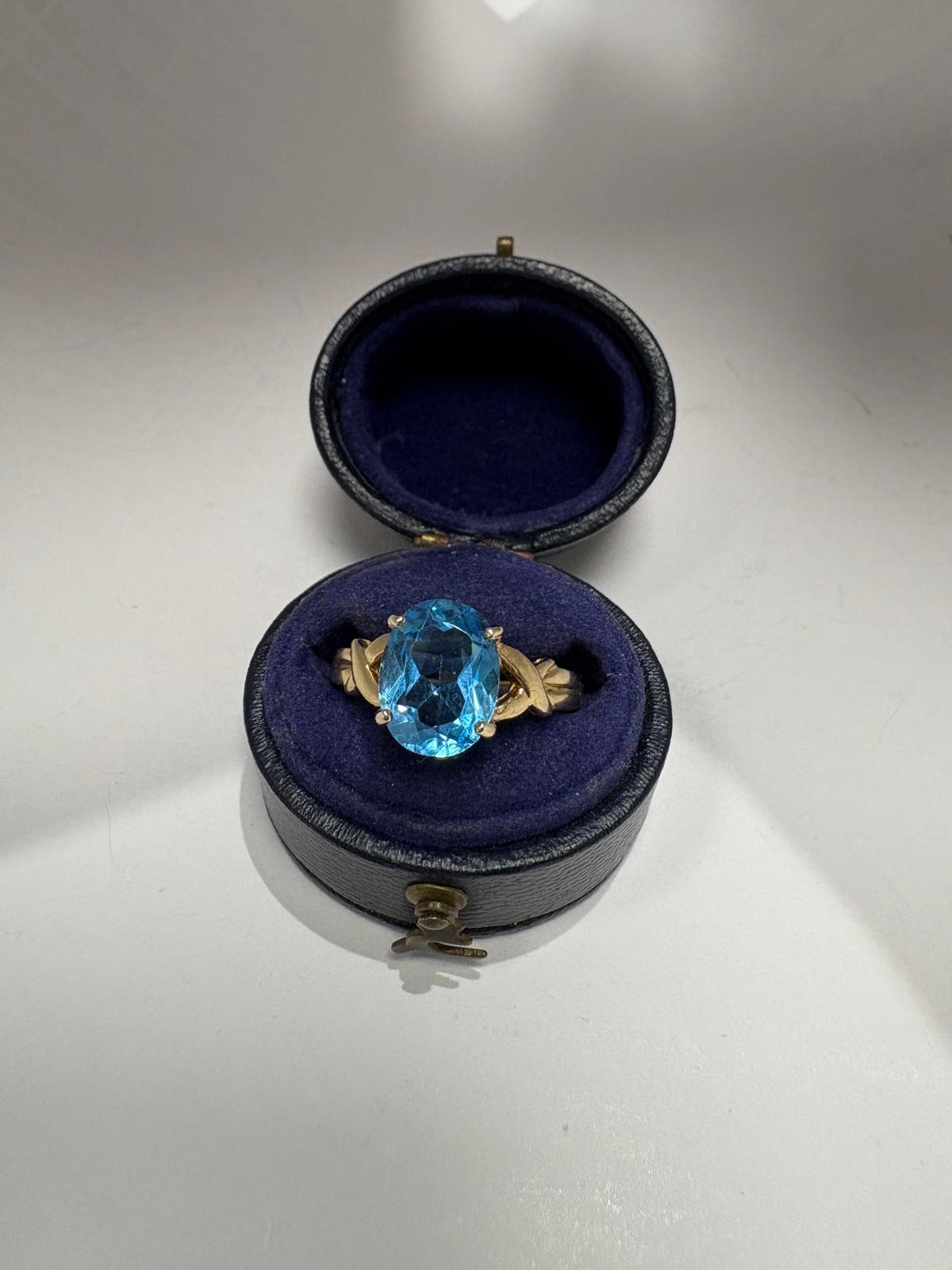 9k yellow gold Oval Blue Topaz ring size N 1/2 Harrogate jewellers fogal and barnes