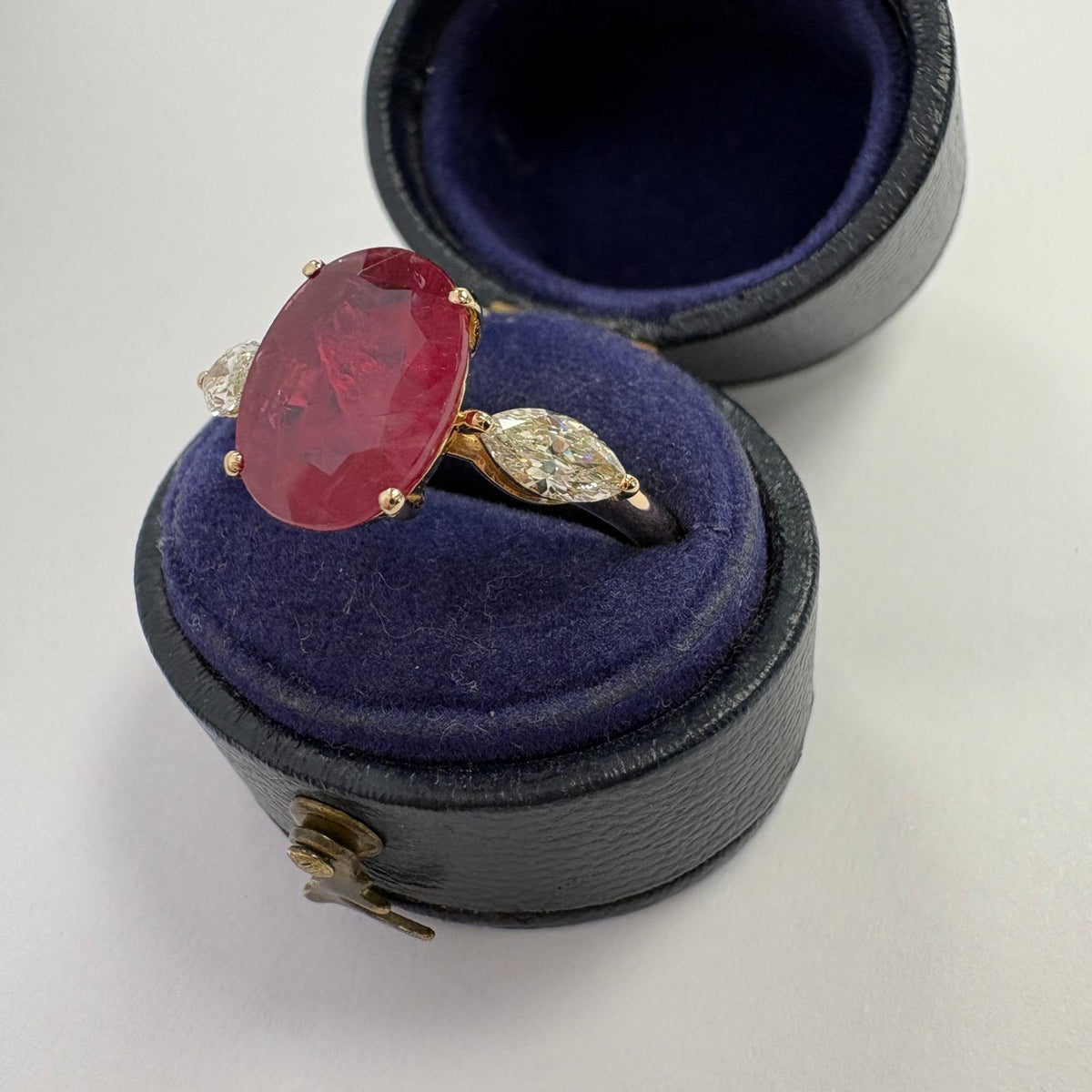 ruby and diamond ring, 3 carat ruby ring, oval ruby ring UK, marquise diamond ring, east west marquise ring, ruby engagement ring, ruby anniversary ring, 18ct gold ruby ring