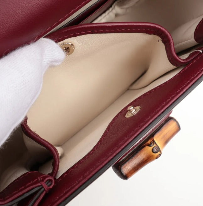 pre-loved Gucci bag UK, Gucci Bamboo 1947 Mini, Gucci Bamboo bag, Gucci Rosso Ancora, red Gucci bag, Gucci patent bag, second hand Gucci UK, Gucci top handle bag, luxury handbags Harrogate, pre-loved designer bags Yorkshire