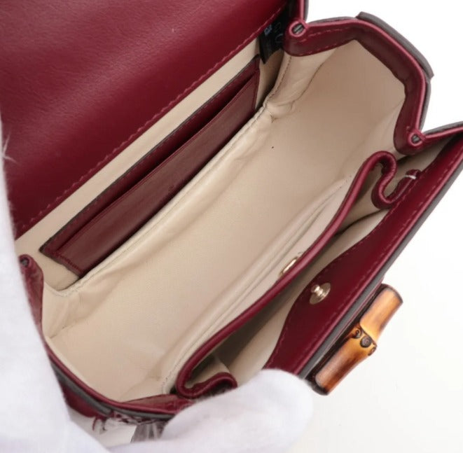pre-loved Gucci bag UK, Gucci Bamboo 1947 Mini, Gucci Bamboo bag, Gucci Rosso Ancora, red Gucci bag, Gucci patent bag, second hand Gucci UK, Gucci top handle bag, luxury handbags Harrogate, pre-loved designer bags Yorkshire