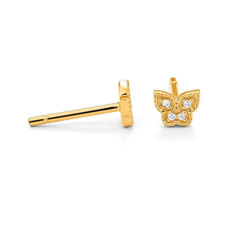 Pair of yellow gold diamond butterfly stud earrings with milgrain edge detailing and eight round brilliant diamonds, shown on white background side angle