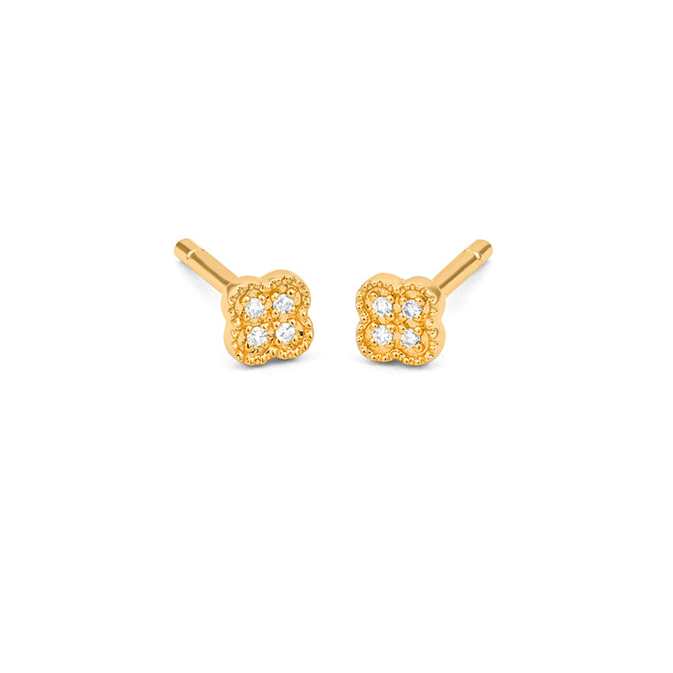Yellow gold diamond clover stud earrings with milgrain edge detailing and four round brilliant diamonds, shown on white background