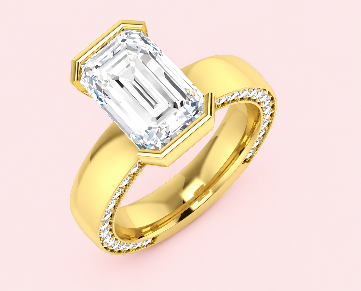 3.01ct emerald cut lab-grown diamond engagement ring in 18k yellow gold with half bezel setting