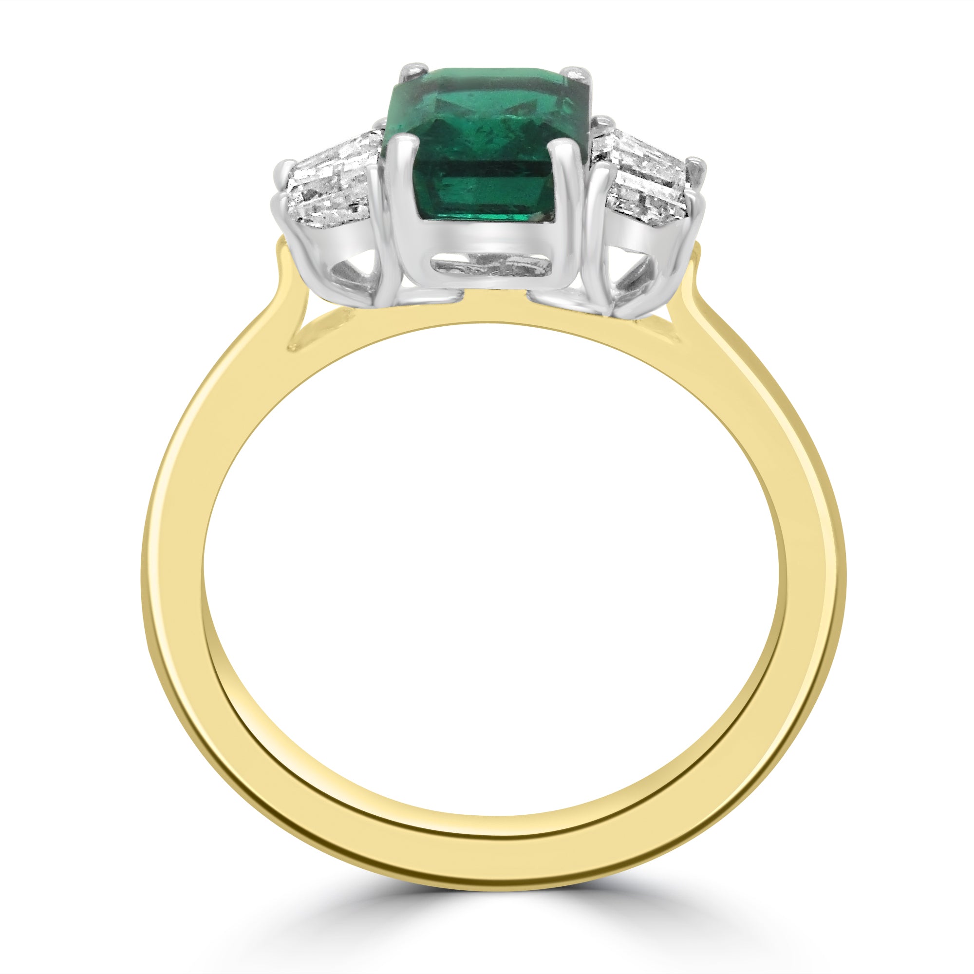 Emerald cut emerald and diamond set on 18k yellow gold engagement ring from fogal and barnes fine jewellers of harrogate.