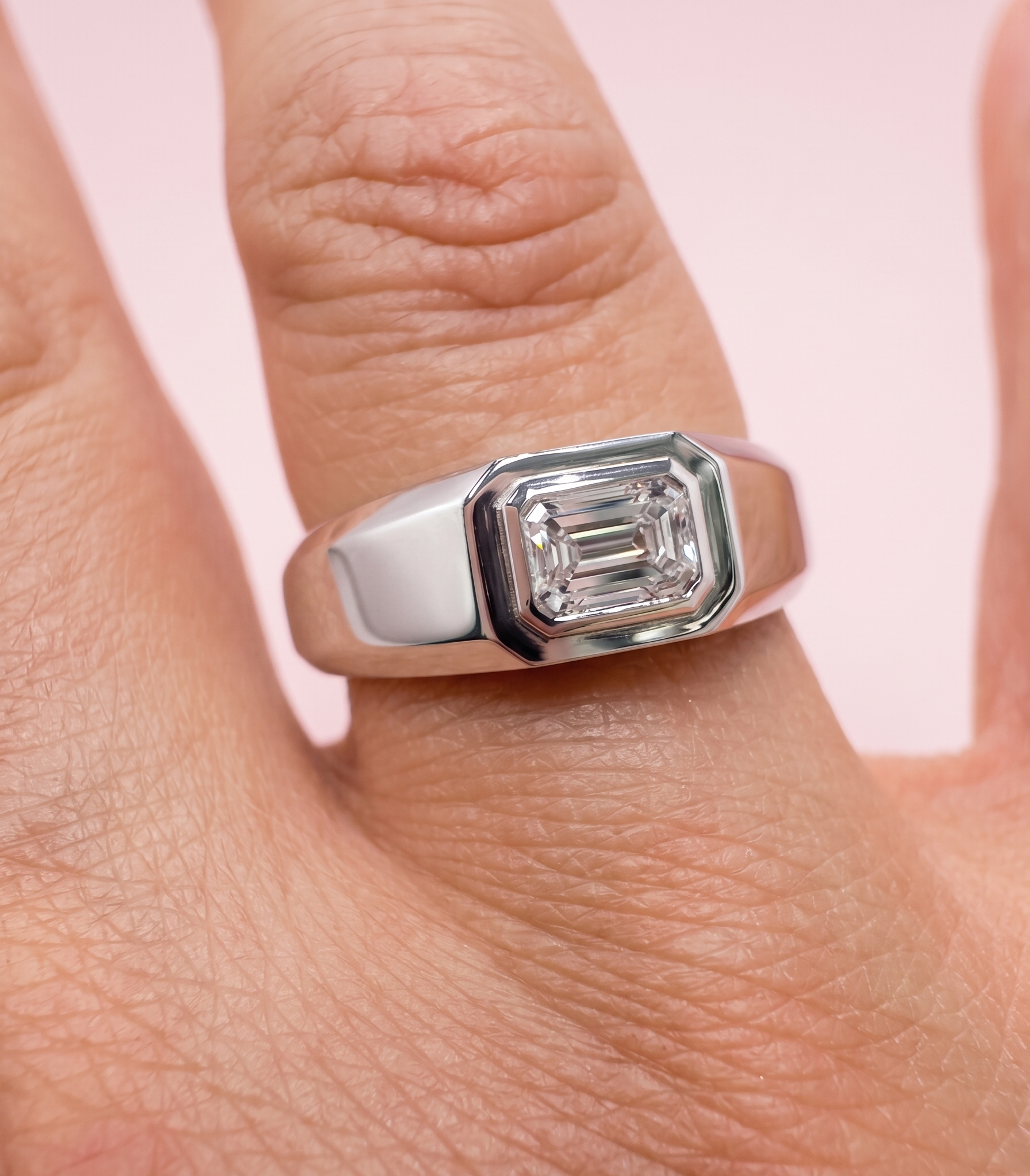 chunky emerald cutlab grown diamond mens engagement ring, set on platinum harrogate jewellers. Dua lipa and Miley cyrus engagement ring inspired Uk Jewellers