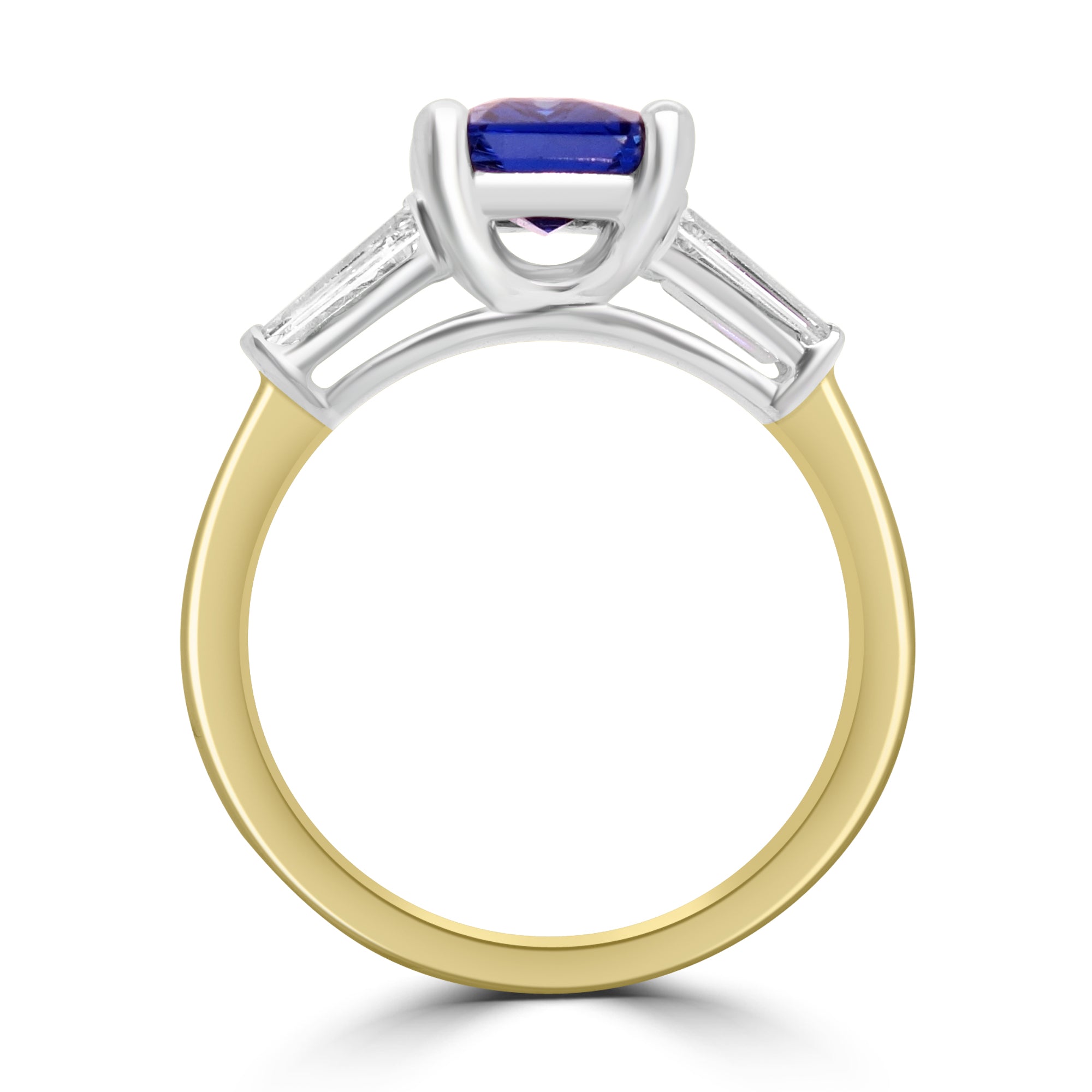Emerald cut sapphire and diamond three stone engagement ring set on 18k yellow gold from fogal and barnes fine jewellers of Harrogate