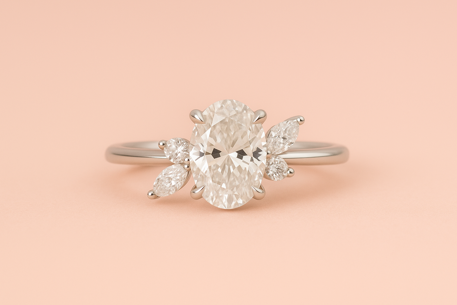 Eveline lab-grown oval diamond engagement ring in white gold with marquise and round side stones – Fogal & Barnes Harrogate