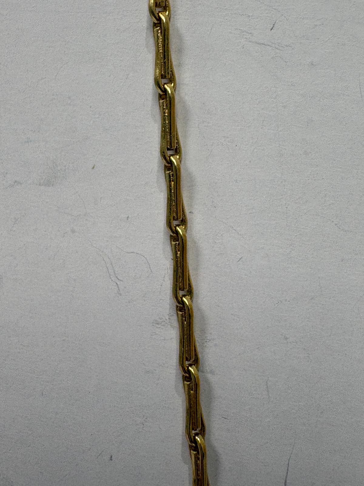 Pre-loved 18ct yellow gold Jerusalem Cross pendant and chain shown on neck, 44cm