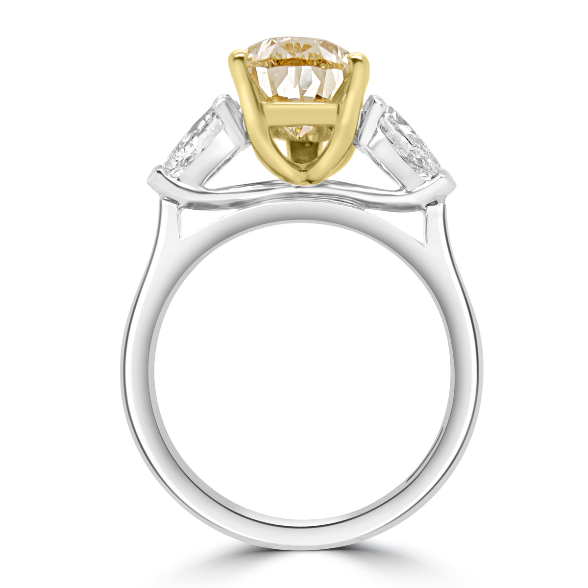 fancy yellow pear diamond ring, fancy light yellow diamond engagement ring, IGI certified yellow diamond, pear cut diamond three stone ring, natural yellow diamond UK, fancy colour diamond jeweller Harrogate