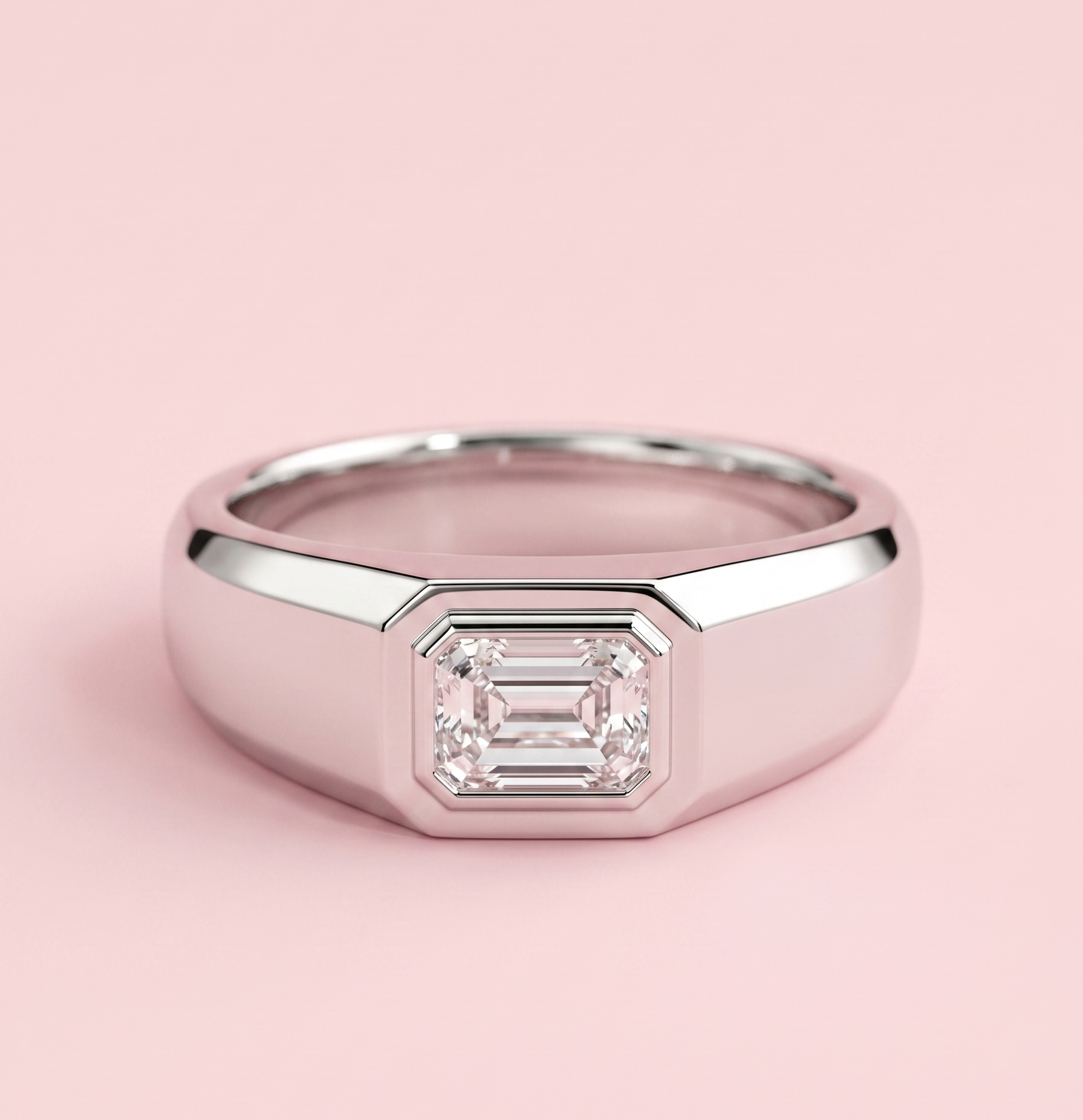 Chunky emerald cut lab grown diamond mens engagement rings Harrogate Jewellers. Dua lipa inspired engagement ring bezel set east west diamond ring.
