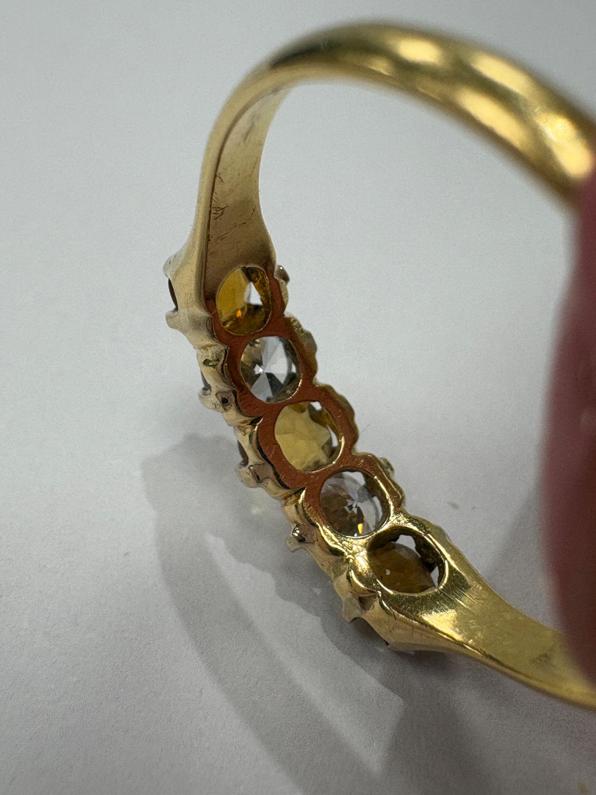 Vintage 18ct yellow gold citrine and white stone five stone graduating ring size S½ with three amber citrines alternating with two white stones in claw setting, shown on white background and worn on finger, available at Fogal & Barnes Harrogate