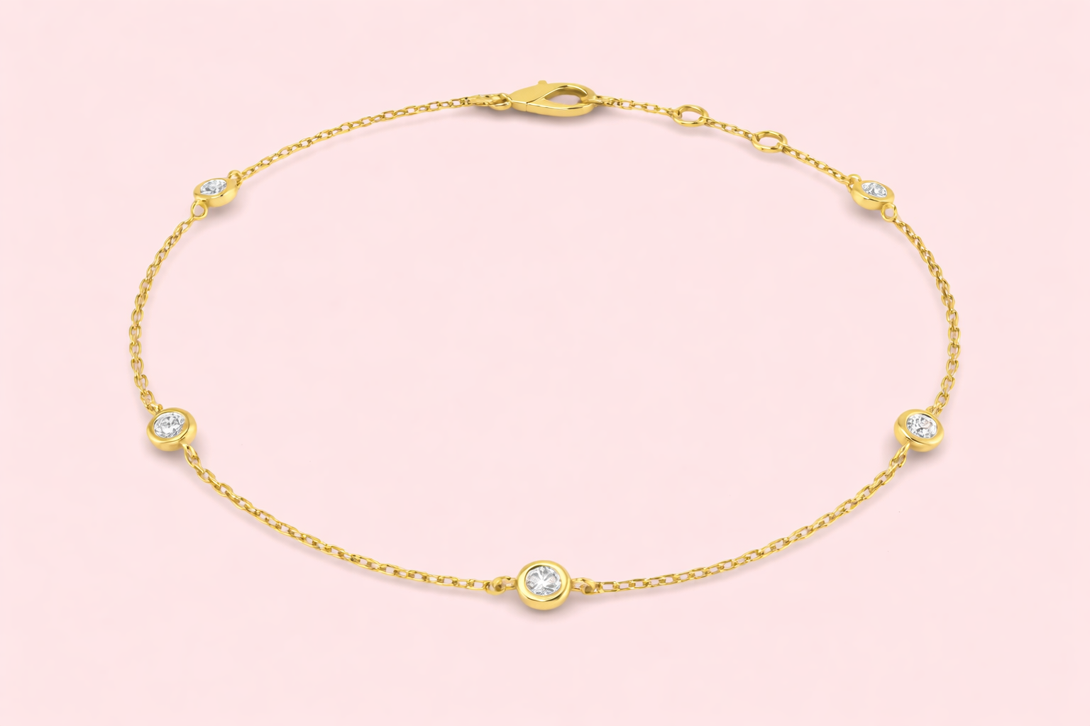 Lab-grown diamond station bracelet in yellow and white gold with bezel set diamonds, bespoke jewellery by Fogal and Barnes Harrogate