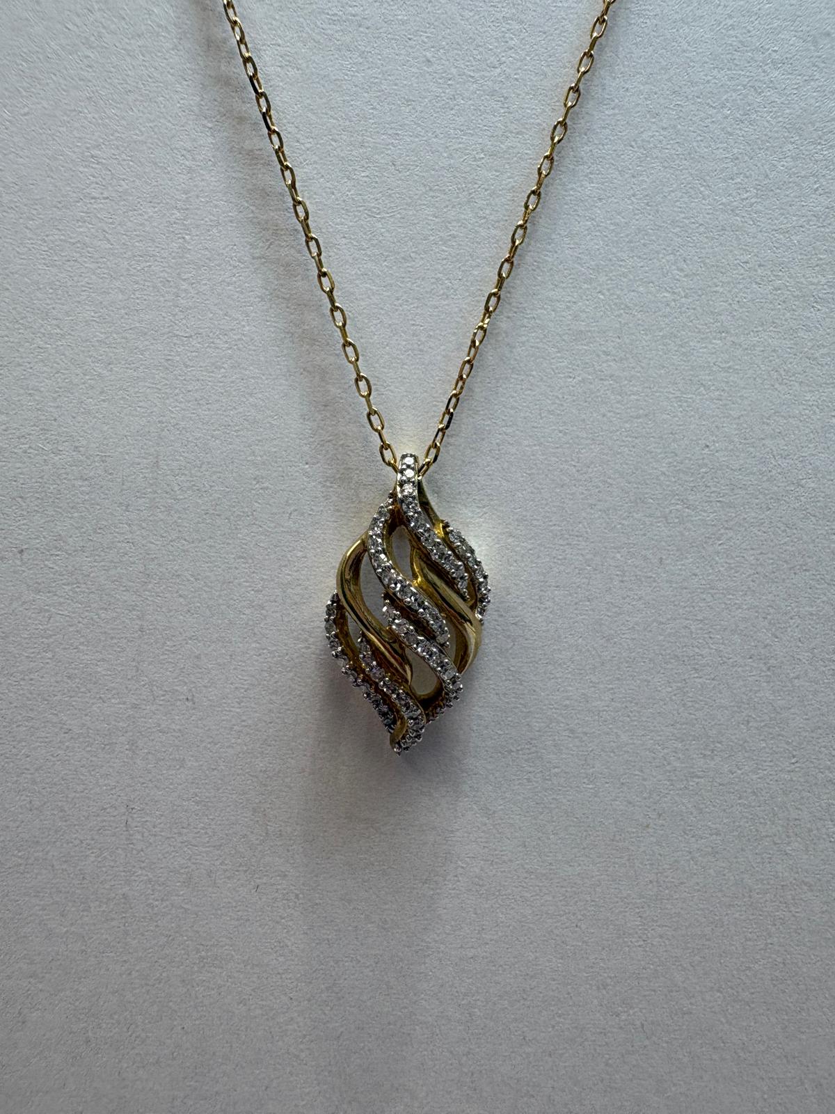 diamond swirl pendant, pre-loved gold necklace, second hand 9ct gold pendant, diamond flame pendant UK, matching diamond jewellery set