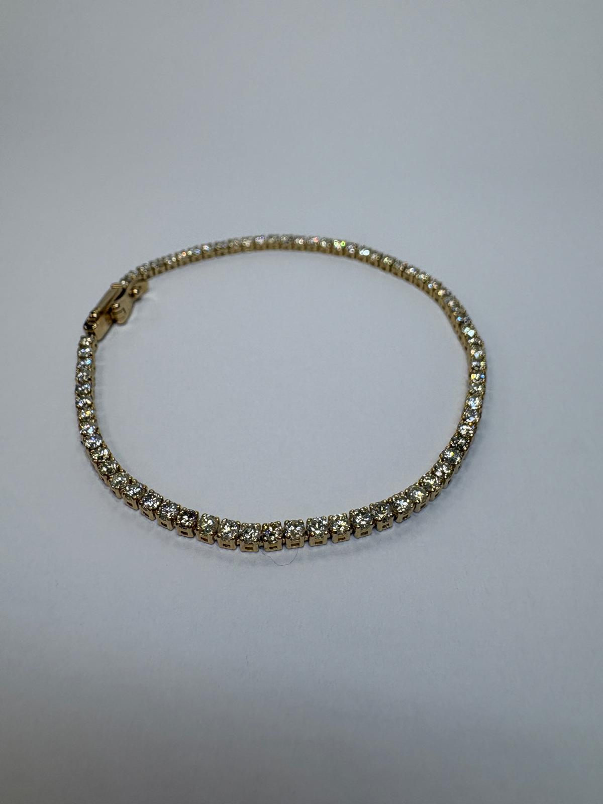 diamond tennis bracelet, pre-loved 14ct gold bracelet, second hand diamond bracelet UK, luxury diamond tennis bracelet, 14ct gold diamond bracelet jewellers
