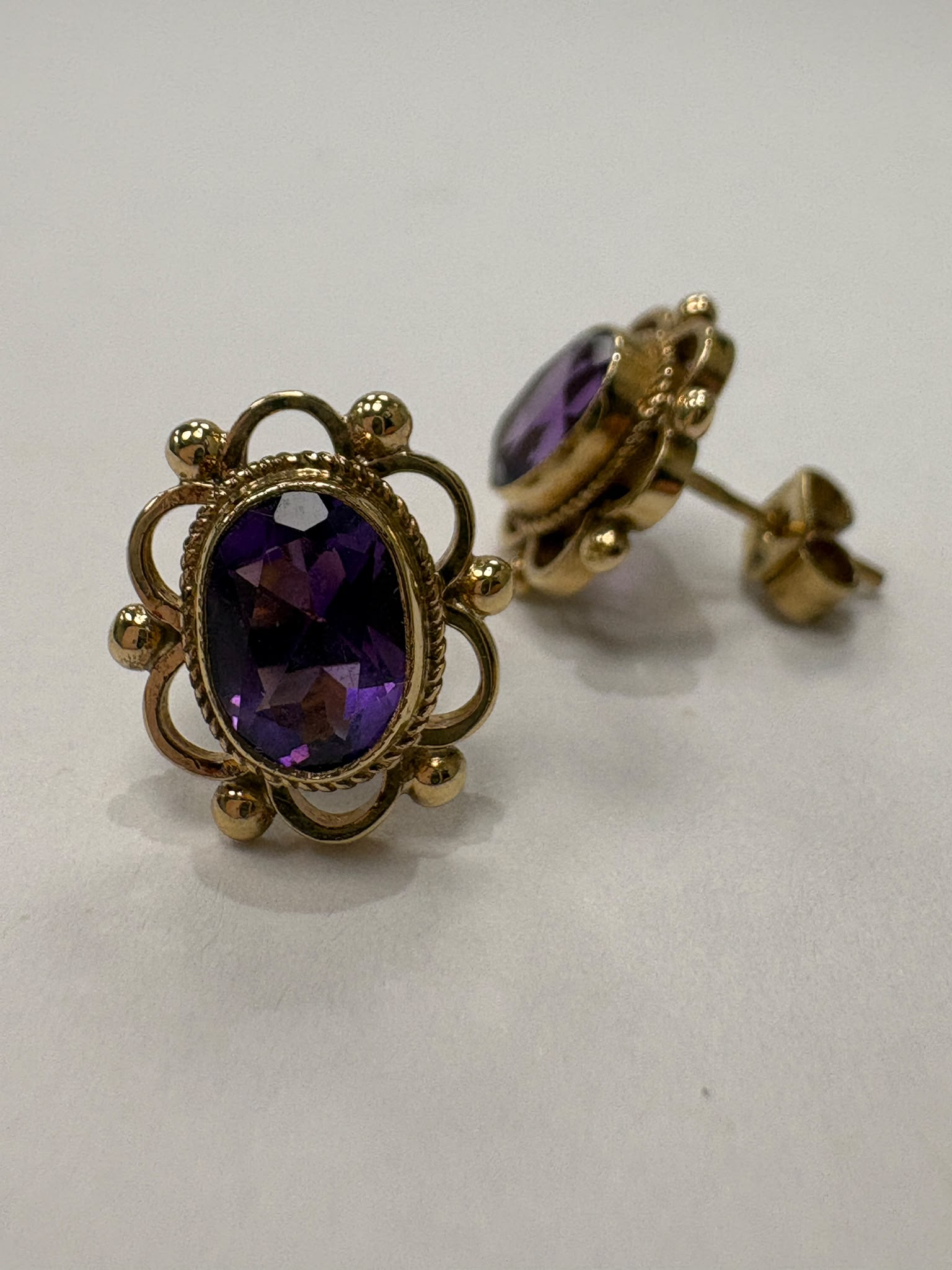 vintage amethyst earrings, pre-loved gold amethyst studs, second hand 9ct gold earrings UK, antique style amethyst earrings, purple gemstone studs Harrogate