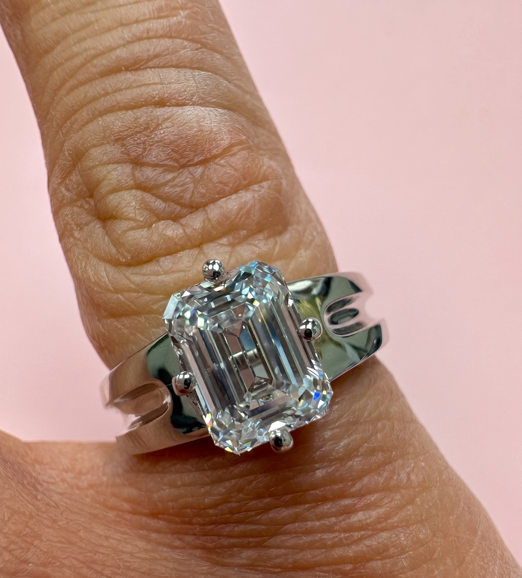 emerald cut engagement ring, emerald cut diamond solitaire, statement engagement ring, split shoulder engagement ring, lab grown diamond engagement ring UK, large emerald cut diamond ring, bespoke engagement ring Harrogate, platinum emerald cut ring, 18ct gold emerald cut ring, certified lab grown diamond, 2ct diamond ring, custom engagement ring Yorkshire, sculptural engagement ring, lab grown diamond ring near me, DVS emerald cut diamond
