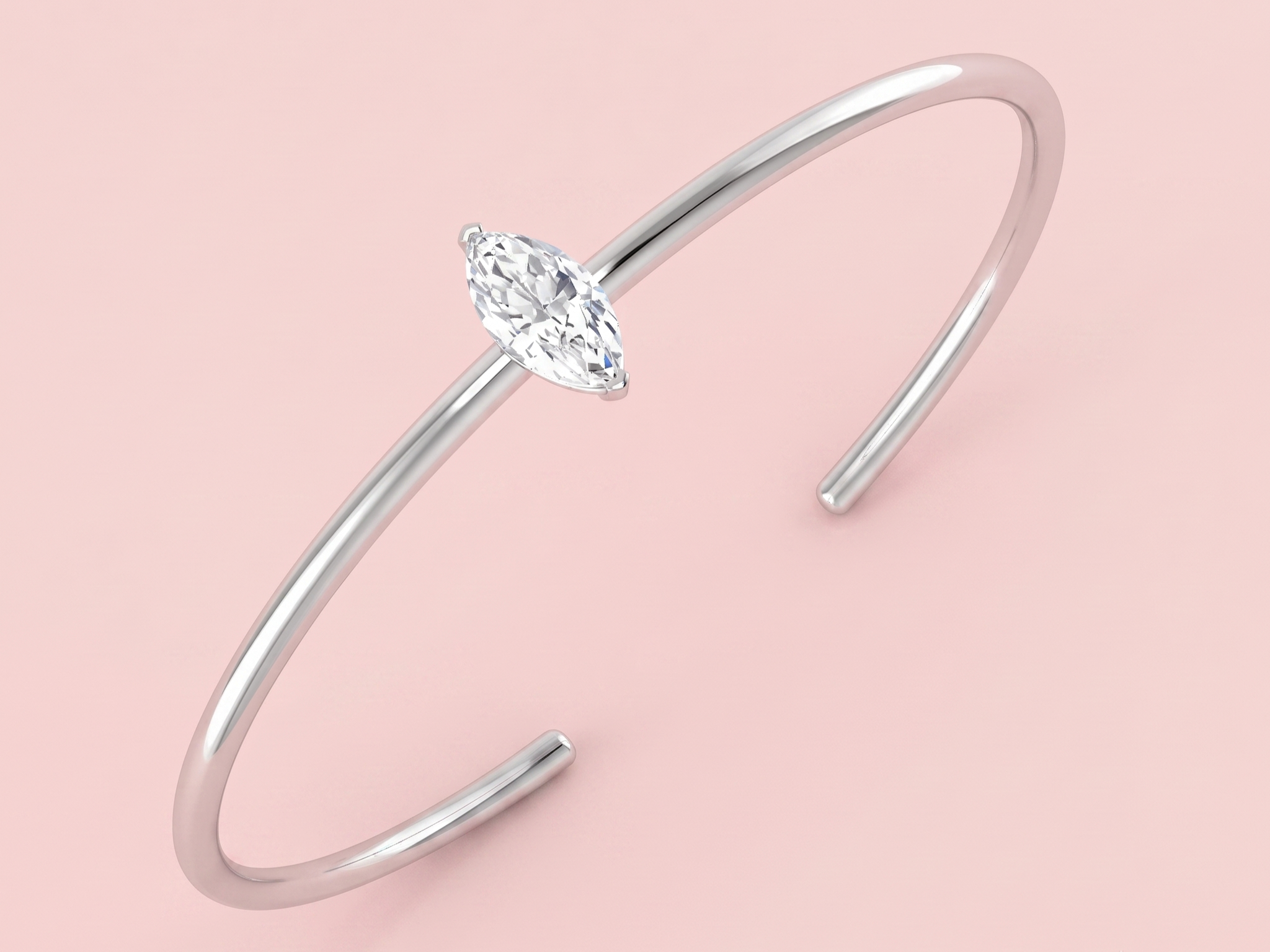 Lab grown marquise cut diamond solitaire open bangle featuring a 1.02ct E/VS2 centre stone shown in white gold