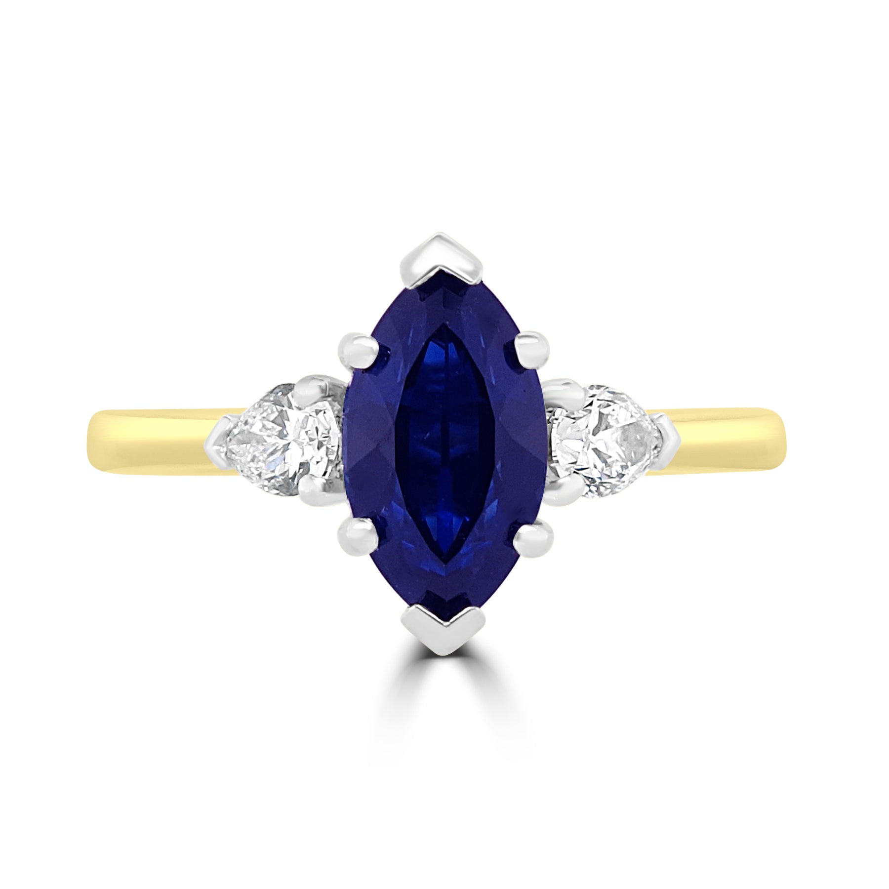 marquise cut sapphire, with pear diamonds engagement ring on 18k yellow gold from fogal and barnes fine jewellers of harrogate