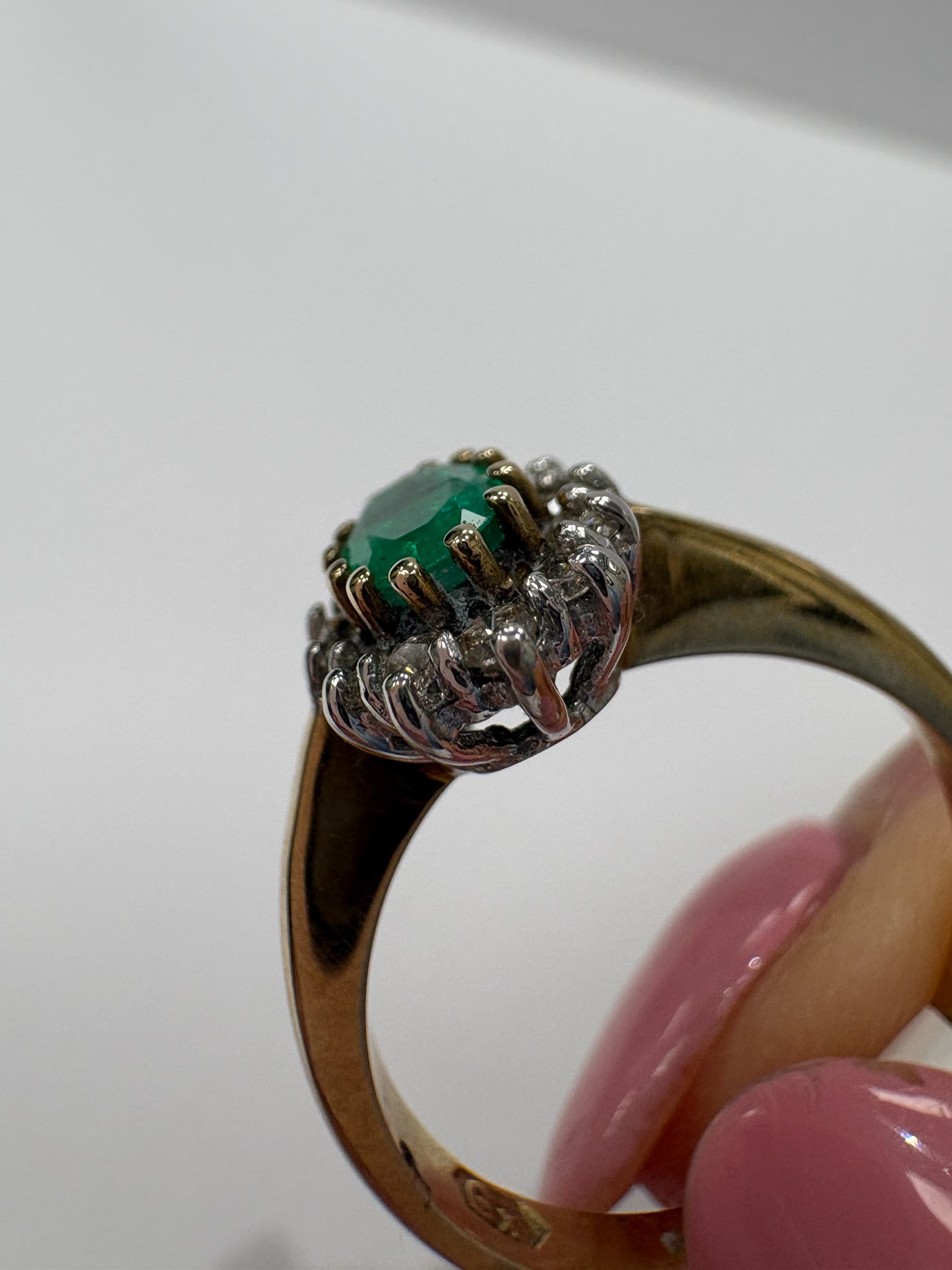 emerald and diamond ring, emerald cluster ring, second hand emerald ring UK, pre-loved emerald ring, vintage emerald ring, 9ct gold emerald ring, oval emerald ring, May birthstone ring, second hand jewellery Harrogate, second hand jewellery Leeds, second hand jewellery York, second hand jewellery Yorkshire, pre-owned emerald ring UK, antique style emerald ring, classic emerald cluster ring, buy second hand emerald ring, emerald ring size N, emerald ring near me, fine jewellery Harrogate, pre-loved jewellery