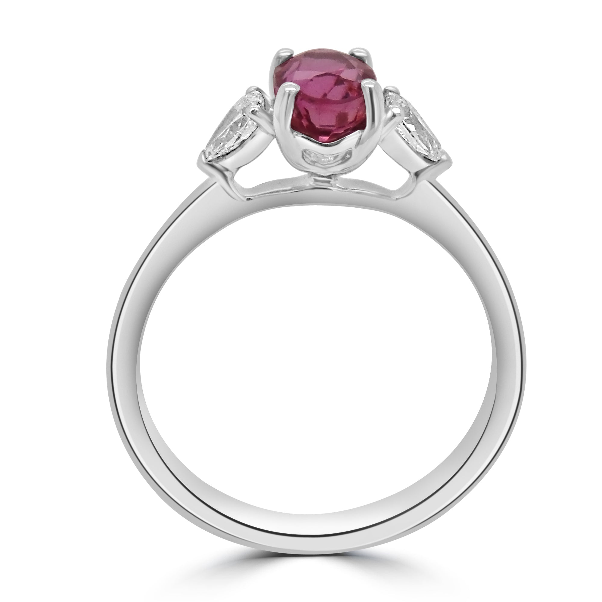 Oval pink sapphire and diamond pear three stone engagement ring set on platinum from fogal and barnes fine jewellers of Harrogate