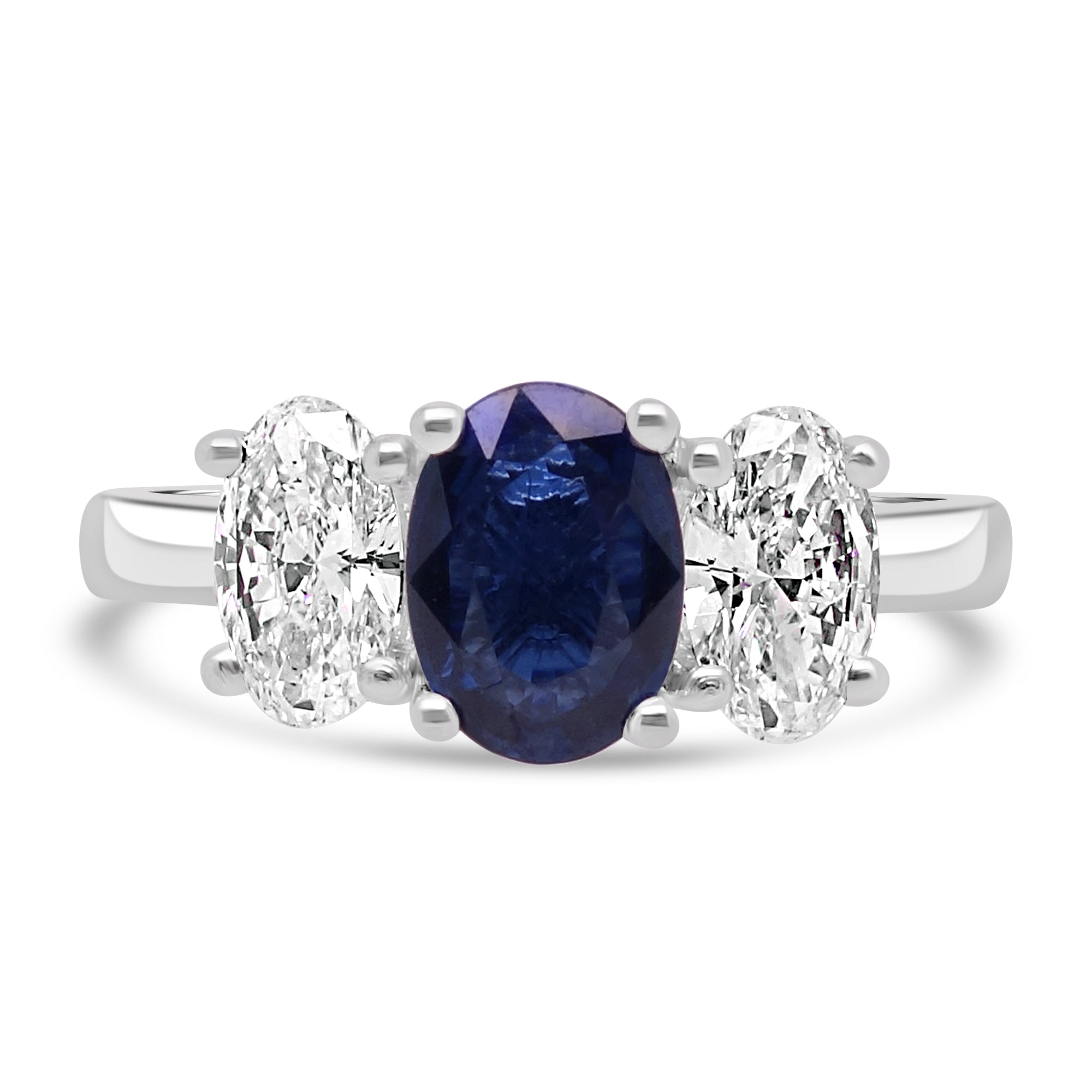 three stone oval cut sapphire and diamond engagement ring, set on platinum from fogal and barnes fine jewellers of Harrogate.