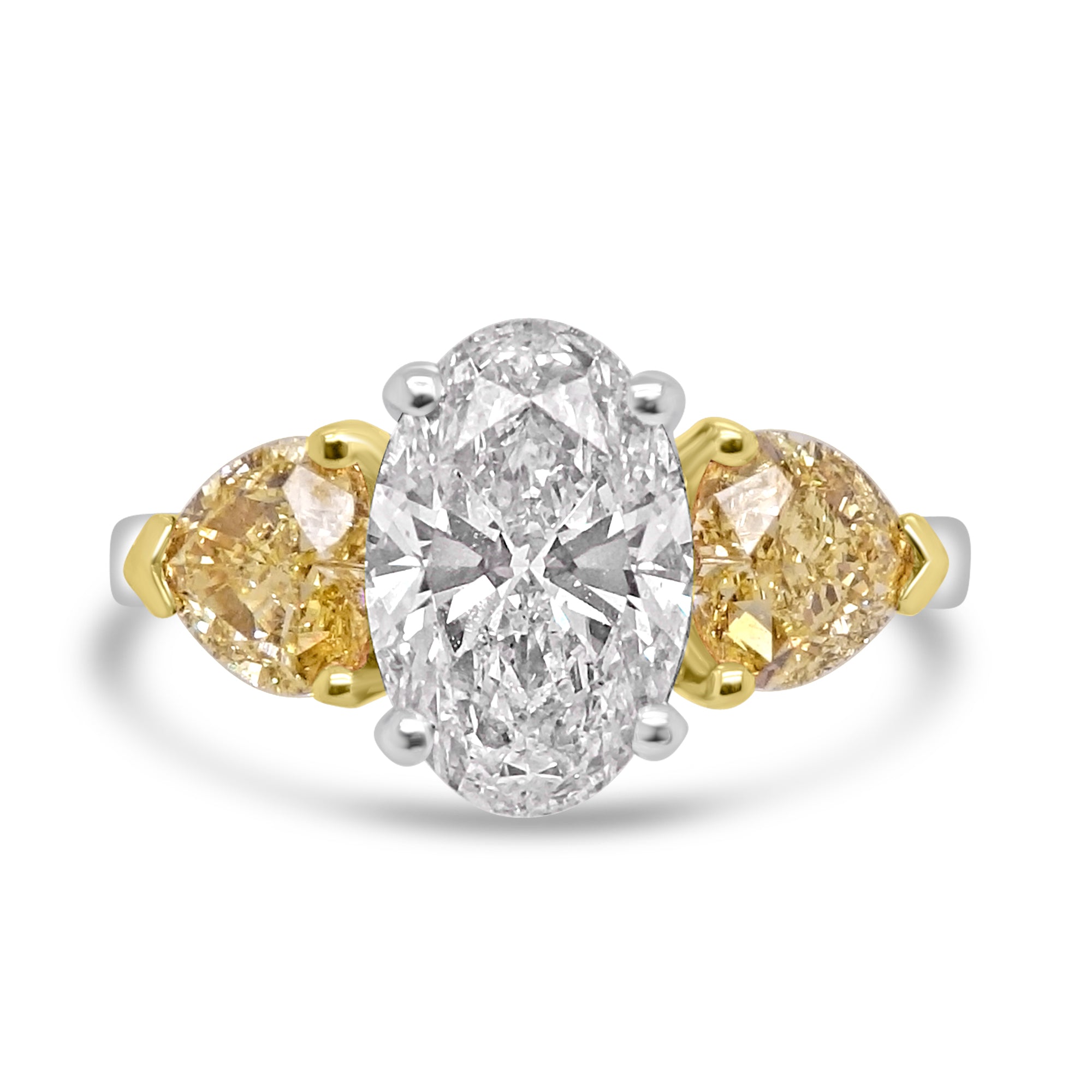Natural Oval Diamond Trilogy with 2 pear cut Yellow Damond Engagement Ring Harrogate Fogal and Barnes Fine Jewelers 2.87ct in total diamond weight set on 18 ct yellow and white gold.