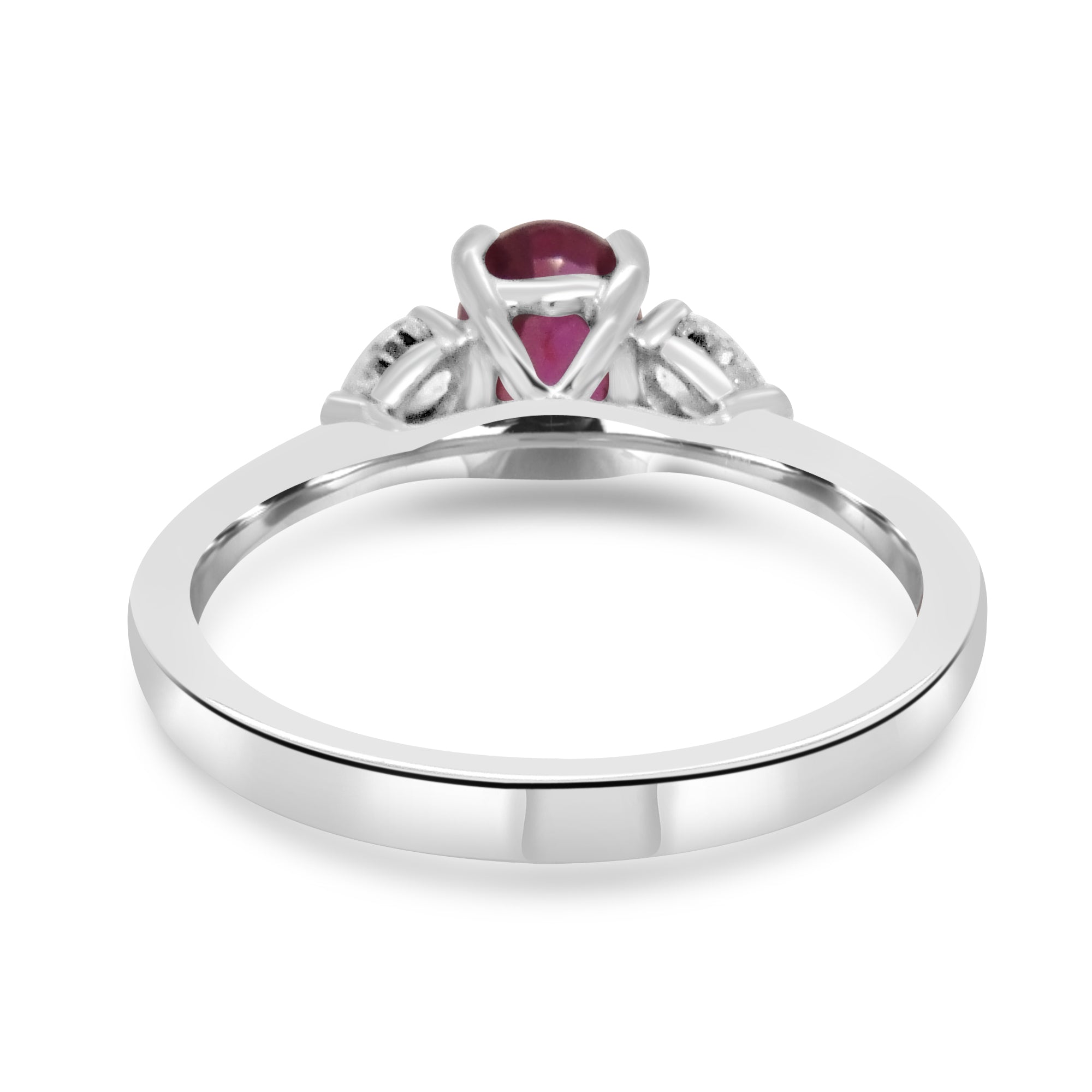 Oval pink sapphire and diamond pear three stone engagement ring set on platinum from fogal and barnes fine jewellers of Harrogate