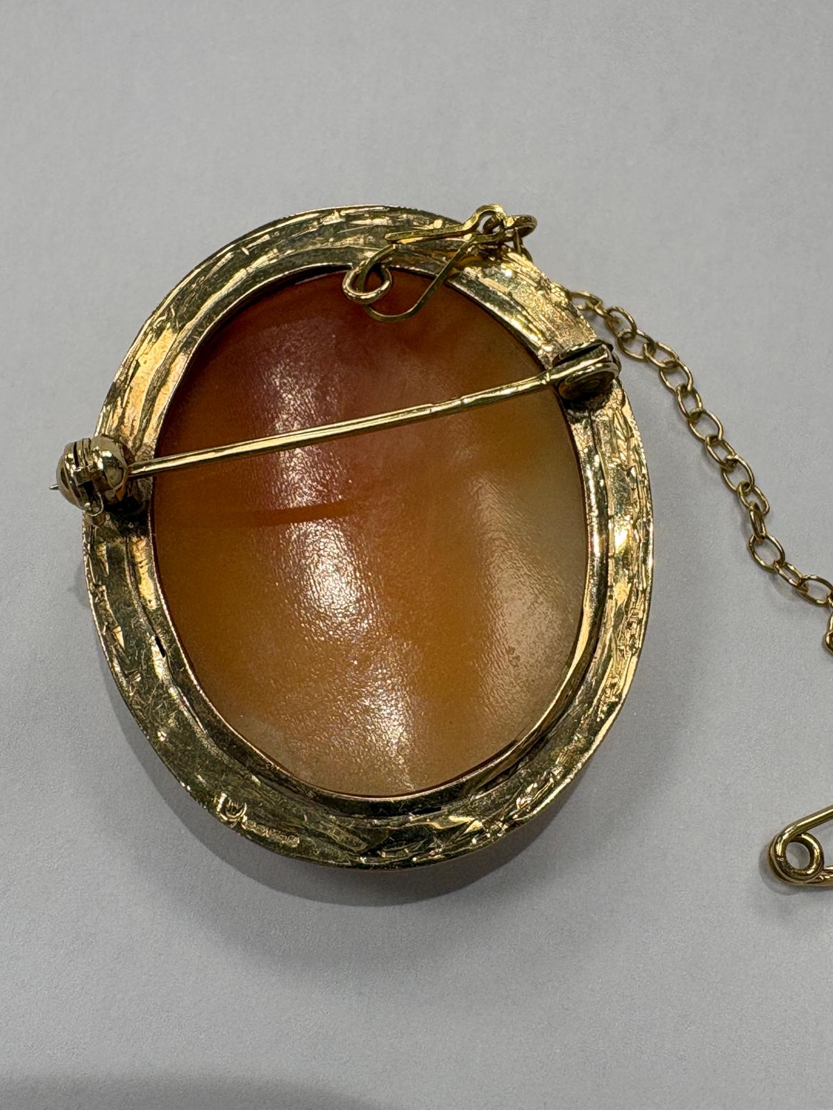Pre-loved Victorian 9ct yellow gold cameo brooch front view with safety chain extended — circa 1860 hand-carved shell