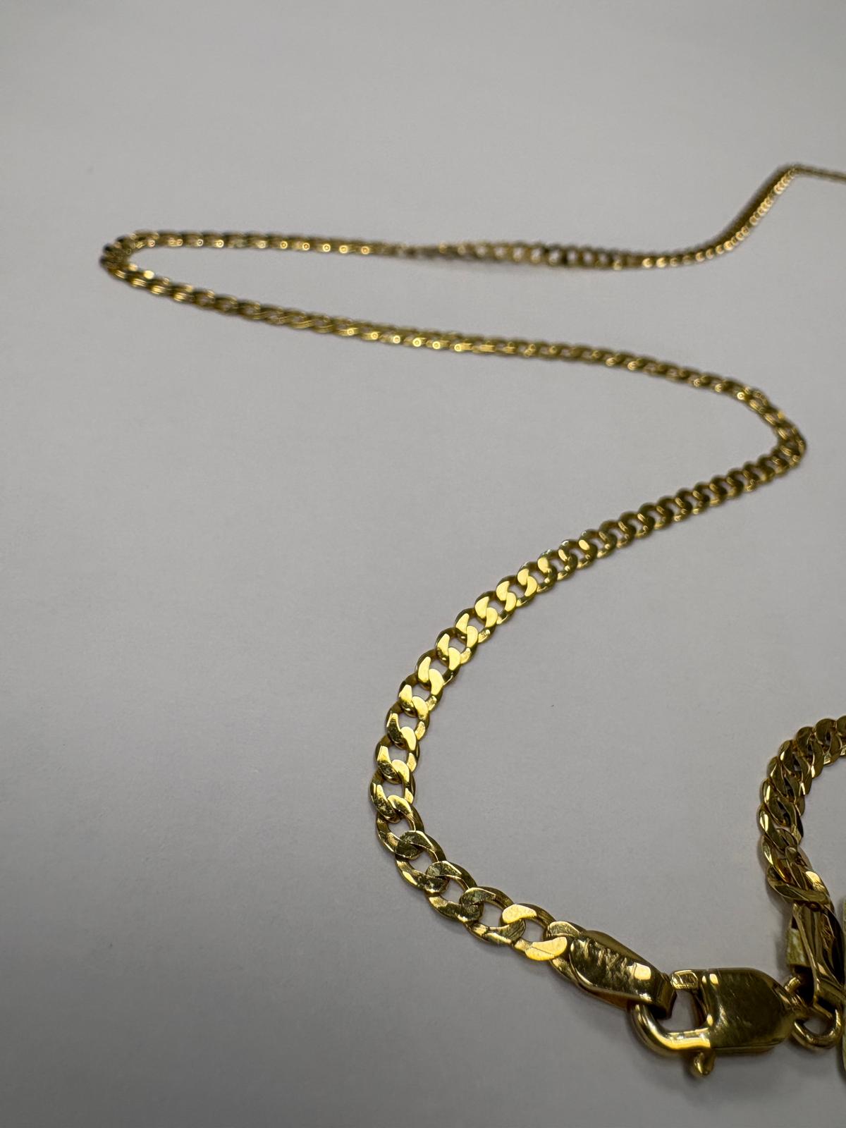 Angled close-up view of a pre-loved yellow gold curb chain necklace showing the lobster clasp end of the chain. The flat polished curb links and lobster clasp are clearly visible against a light grey background.