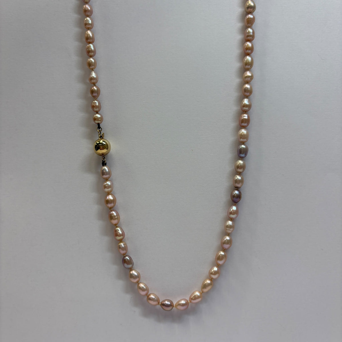 freshwater pearl rope necklace, long pearl necklace UK, blush pearl necklace, opera length pearl necklace, pink pearl necklace, pre-loved pearl necklace, knotted pearl necklace, pearl necklace gold clasp