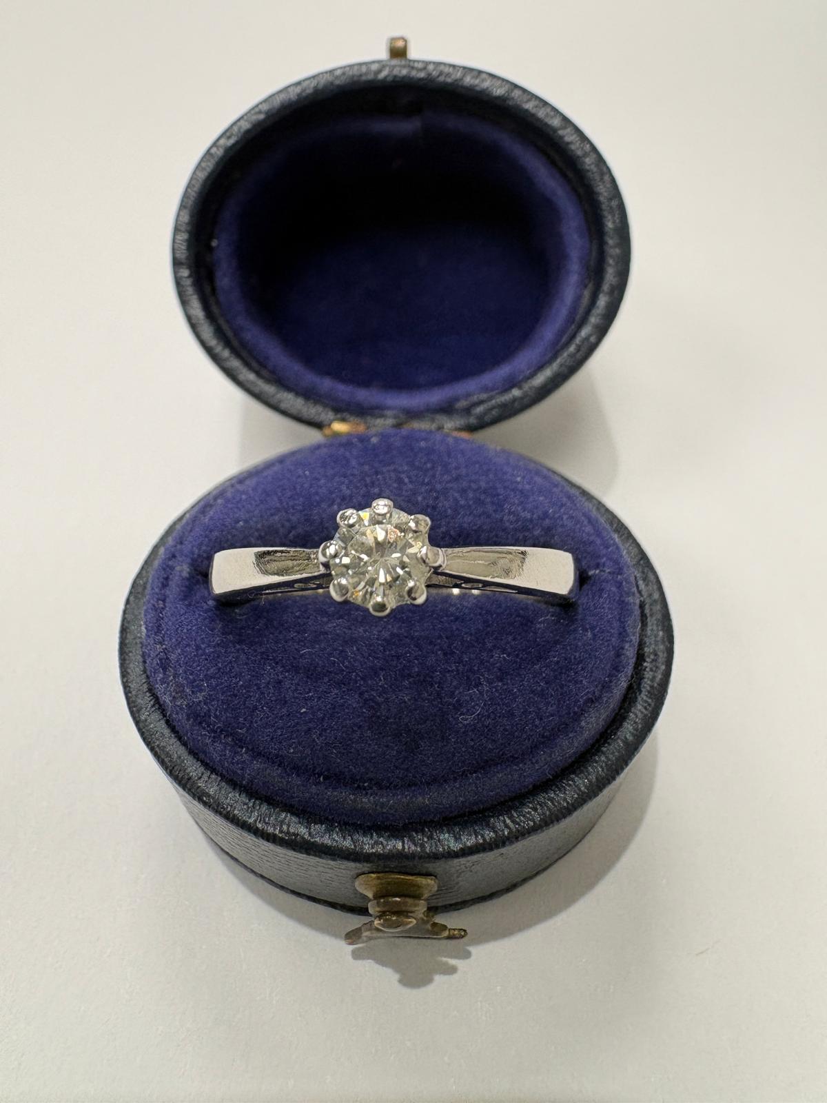 Pre-loved platinum six-claw natural diamond solitaire engagement ring, London hallmarked 950, size R