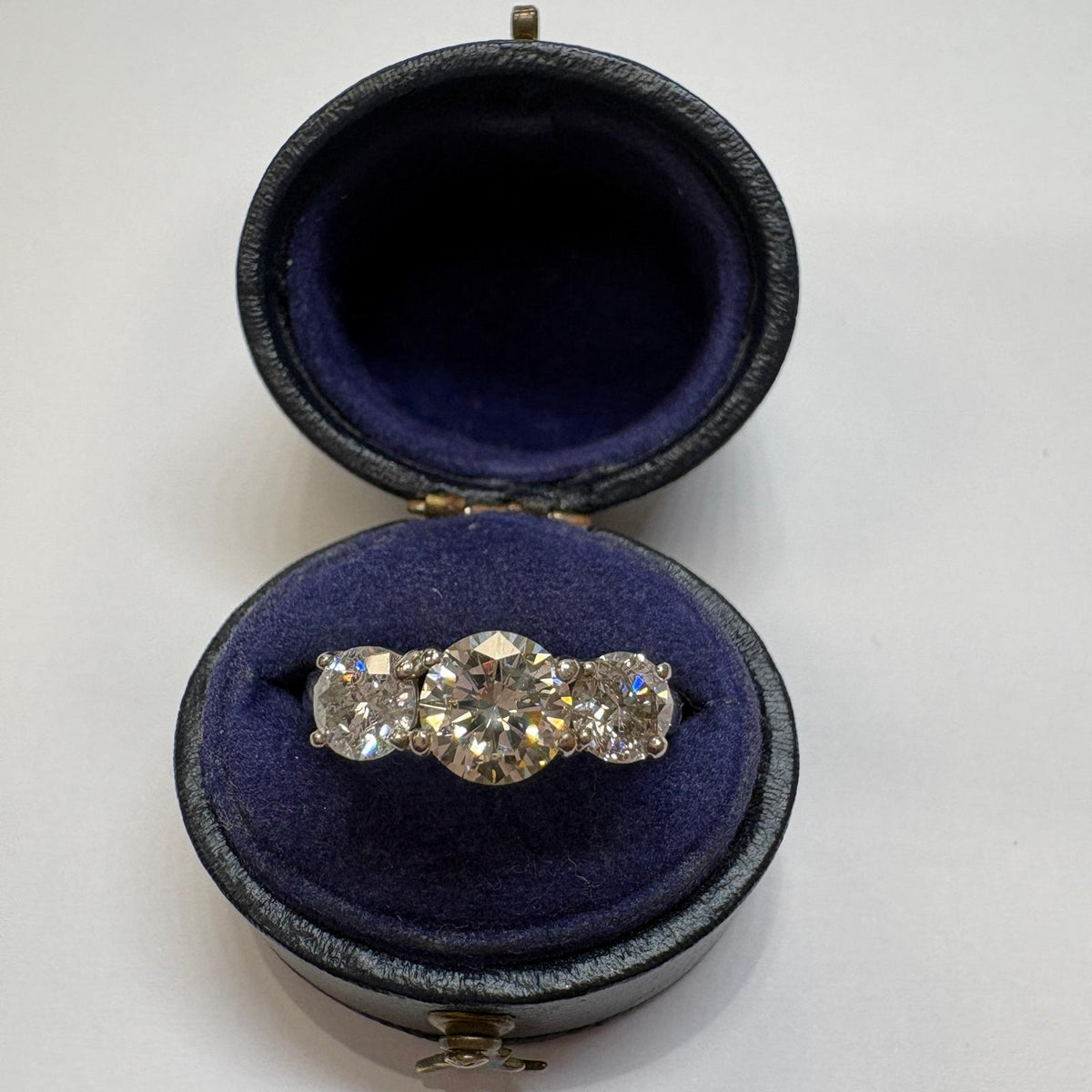 three stone diamond ring, trilogy diamond ring UK, platinum diamond ring, pre-loved engagement ring, second hand diamond ring, 1.5 carat diamond ring, anniversary diamond ring, pre-owned trilogy ring